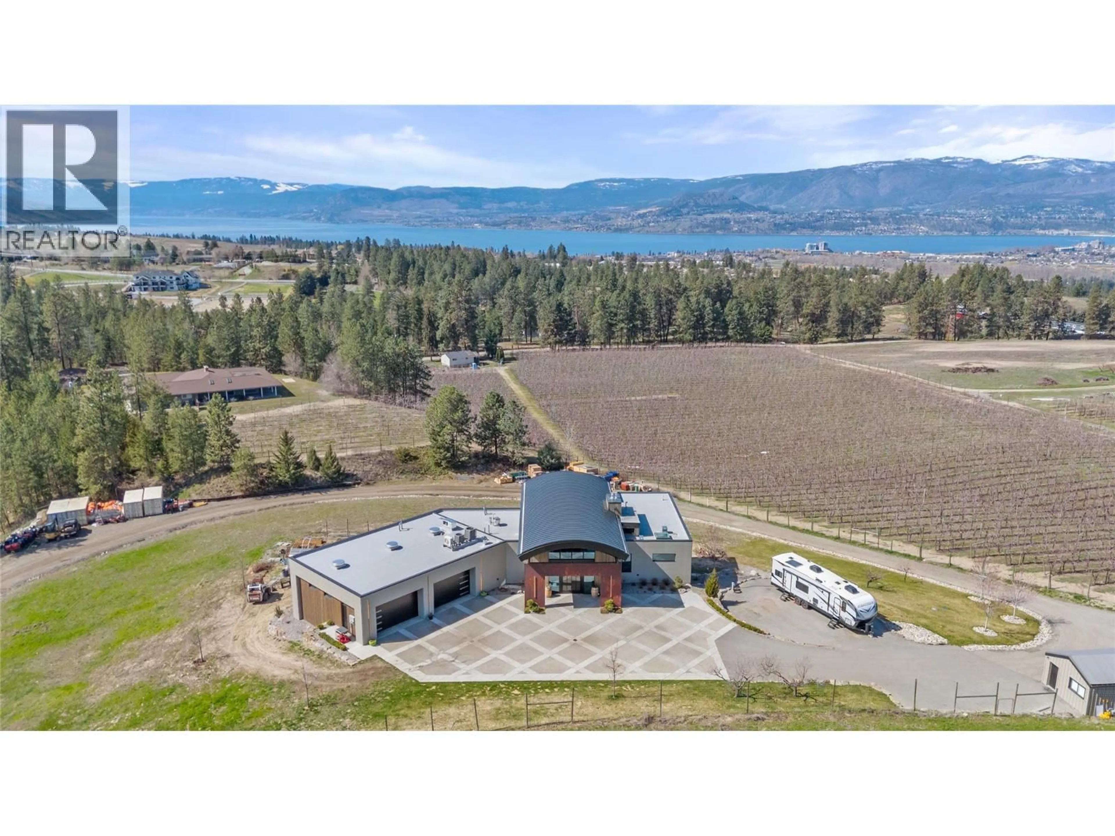 A pic from outside/outdoor area/front of a property/back of a property/a pic from drone, mountain view for 4275 TODD ROAD, Kelowna British Columbia V1W4B8