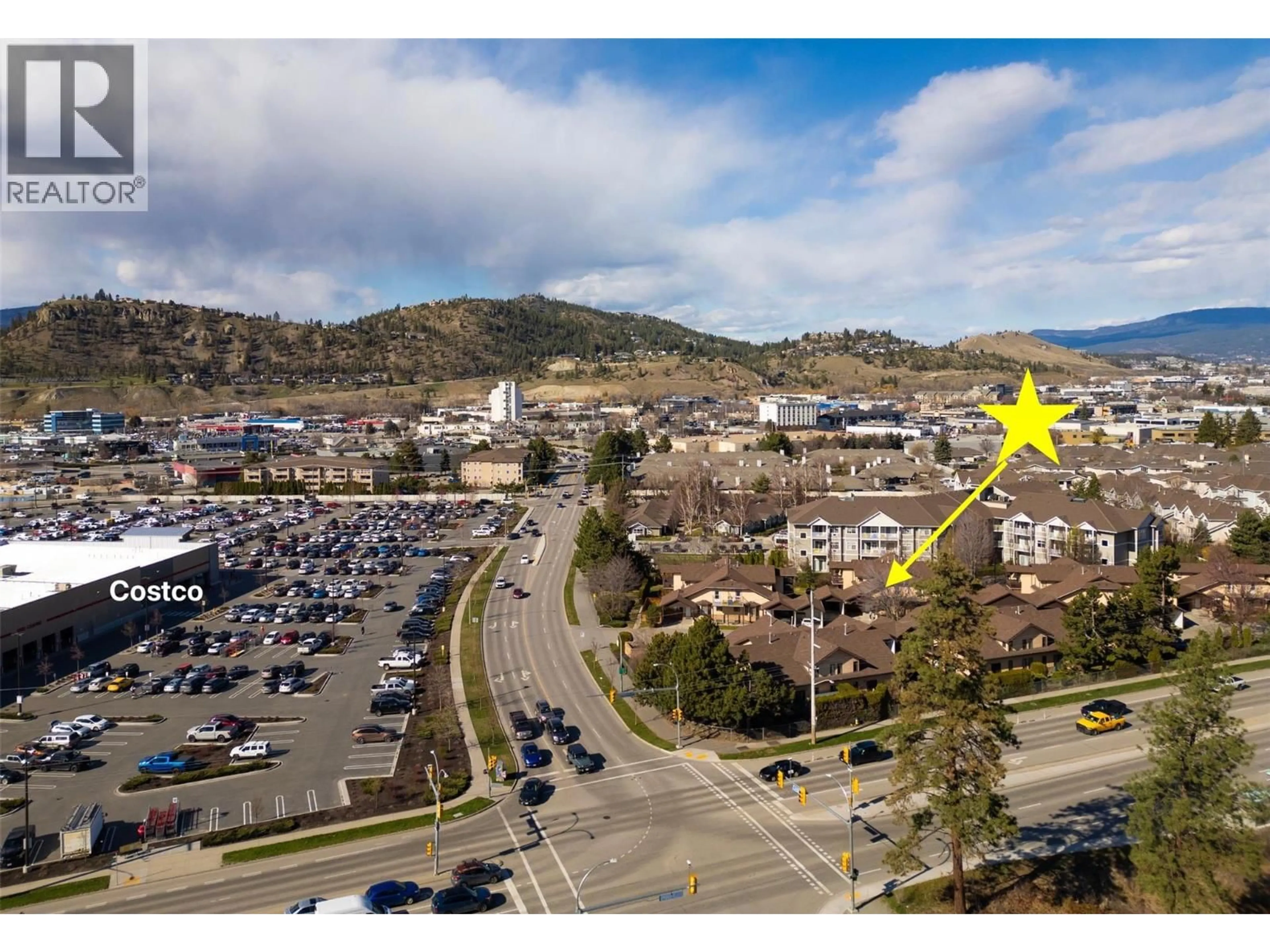 A pic from outside/outdoor area/front of a property/back of a property/a pic from drone, mountain view for 105 - 1855 LECKIE ROAD, Kelowna British Columbia V1X7H8