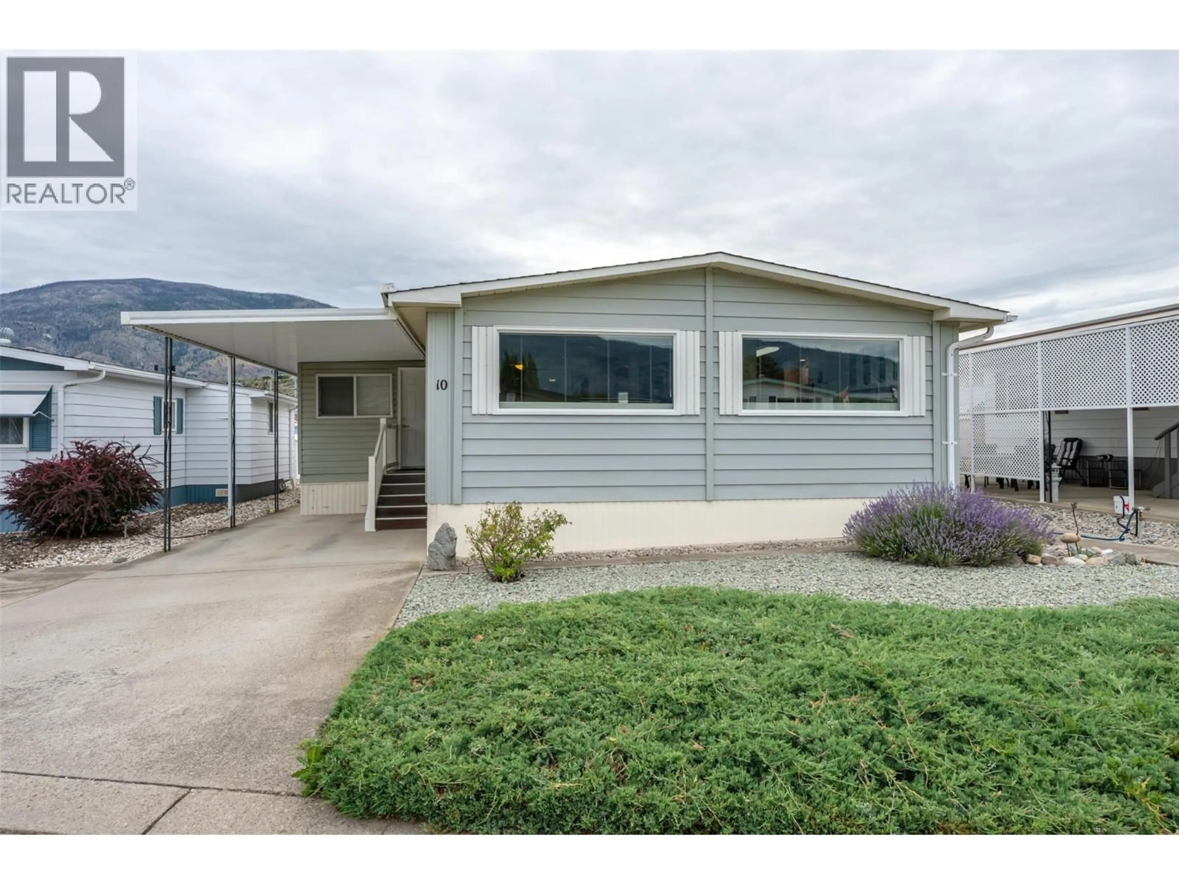 Home with vinyl exterior material, street for 10 - 6601 TUCELNUIT DRIVE, Oliver British Columbia V0H1T3