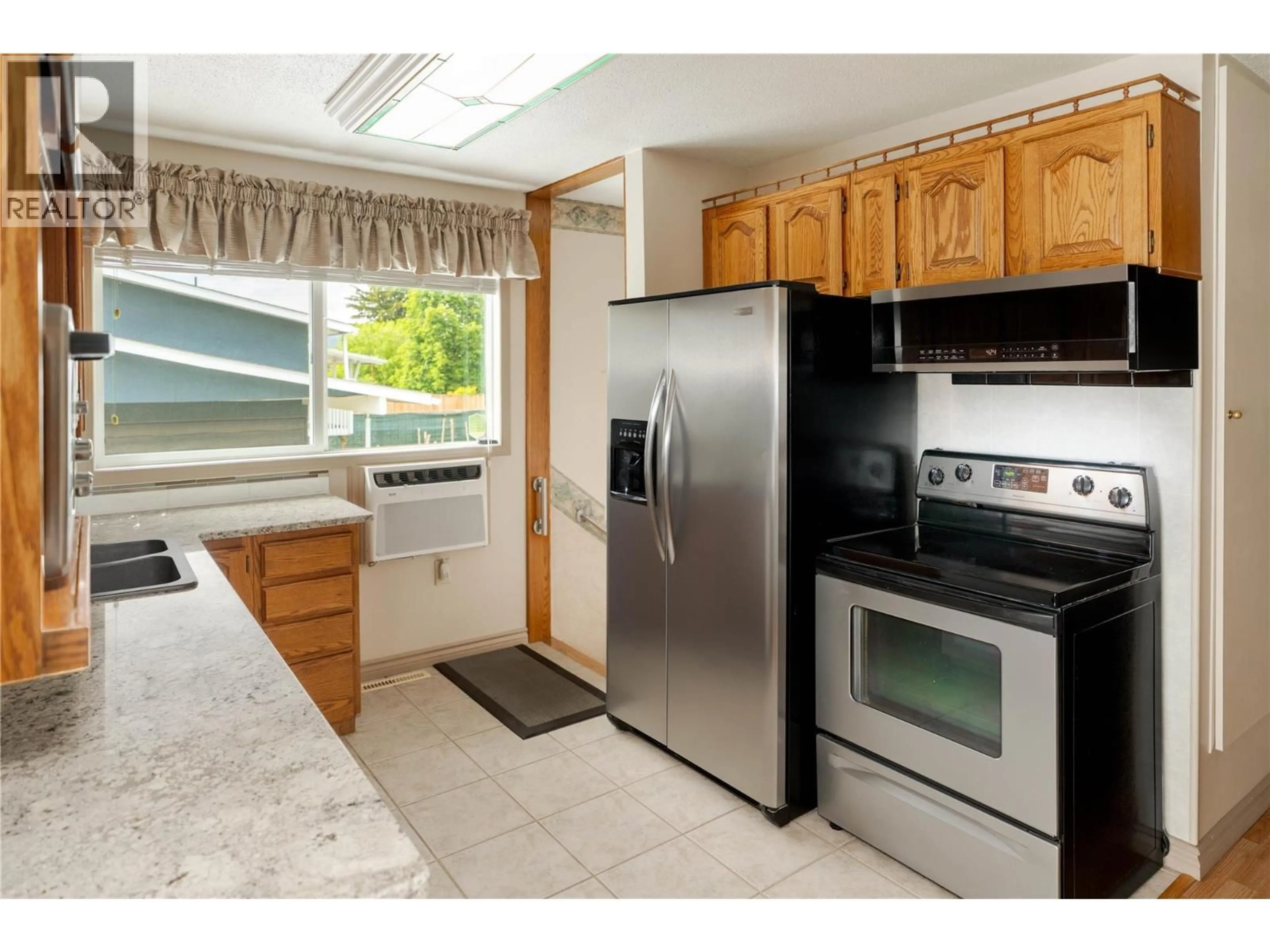 Standard kitchen, unknown for 702 HOLLYDELL ROAD, Kelowna British Columbia V1X1L5