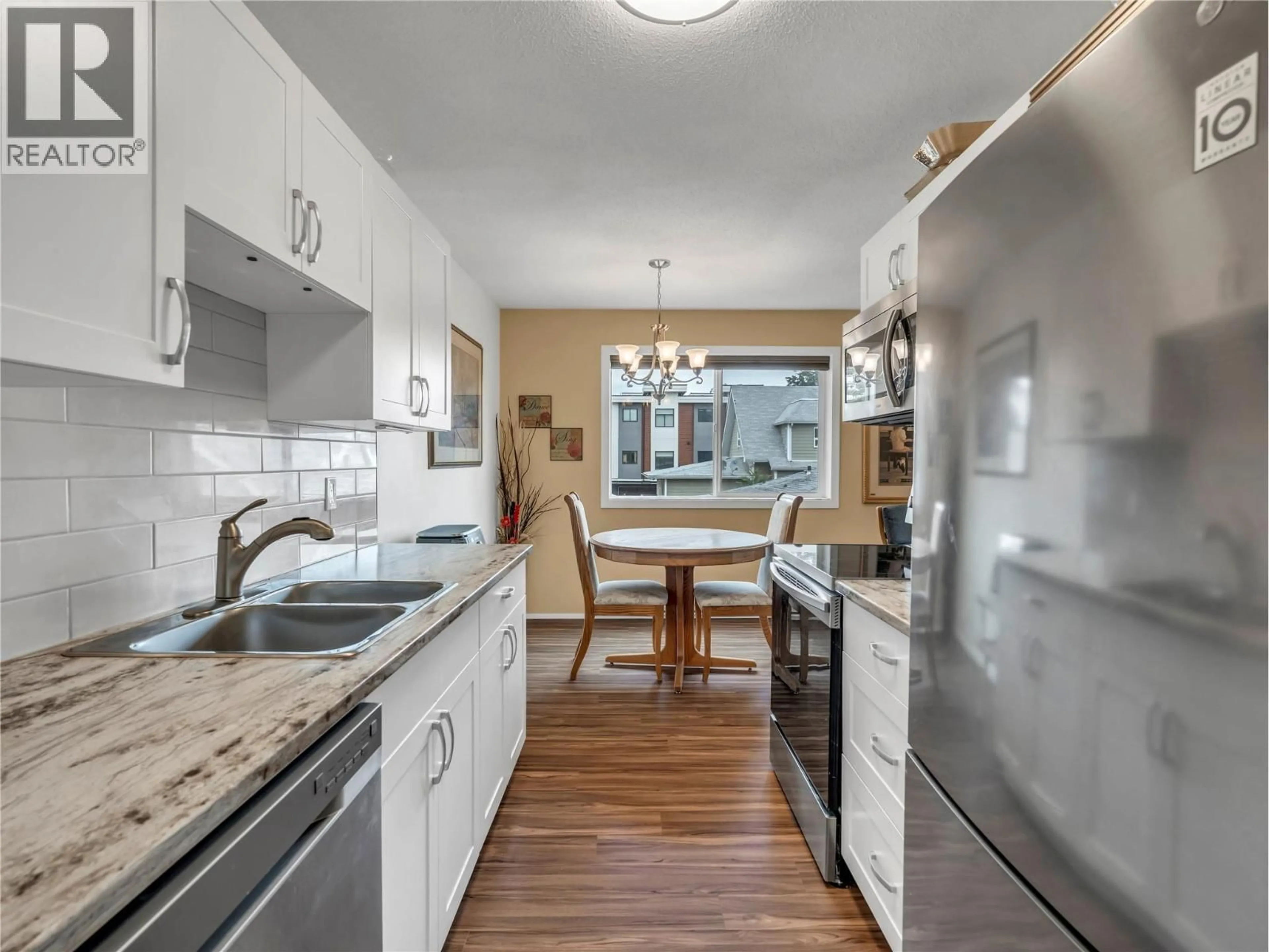 Open concept kitchen, ceramic/tile floor for 212 - 803 FAIRVIEW ROAD, Penticton British Columbia V2A5Y7