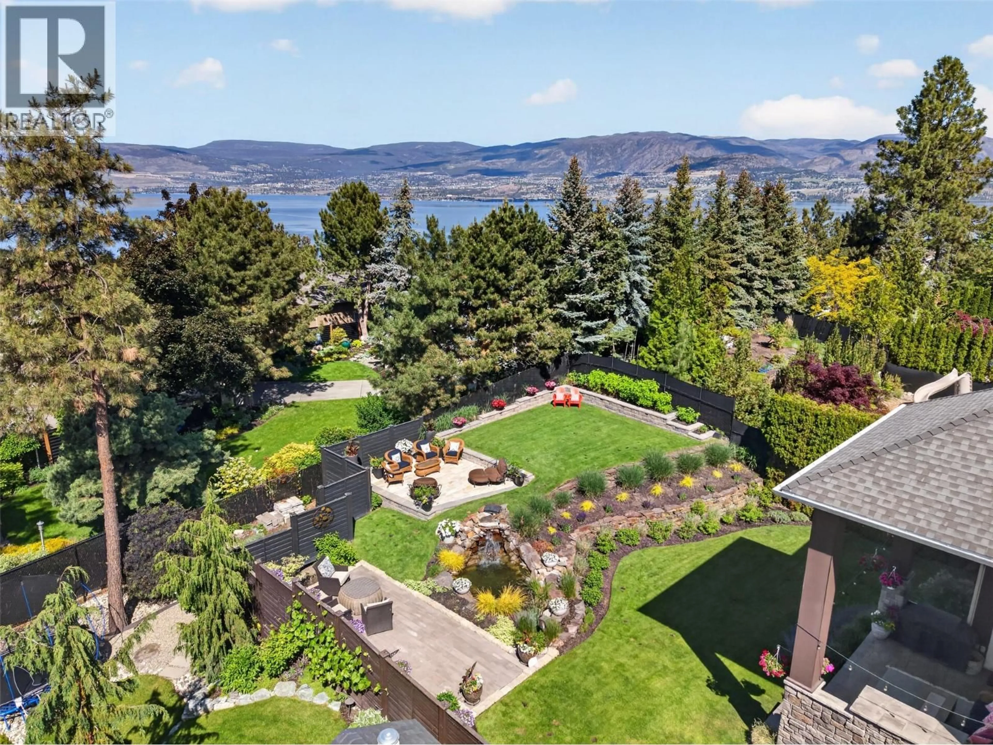 A pic from outside/outdoor area/front of a property/back of a property/a pic from drone, water/lake/river/ocean view for 336 QUILCHENA DRIVE, Kelowna British Columbia V1W4Y9