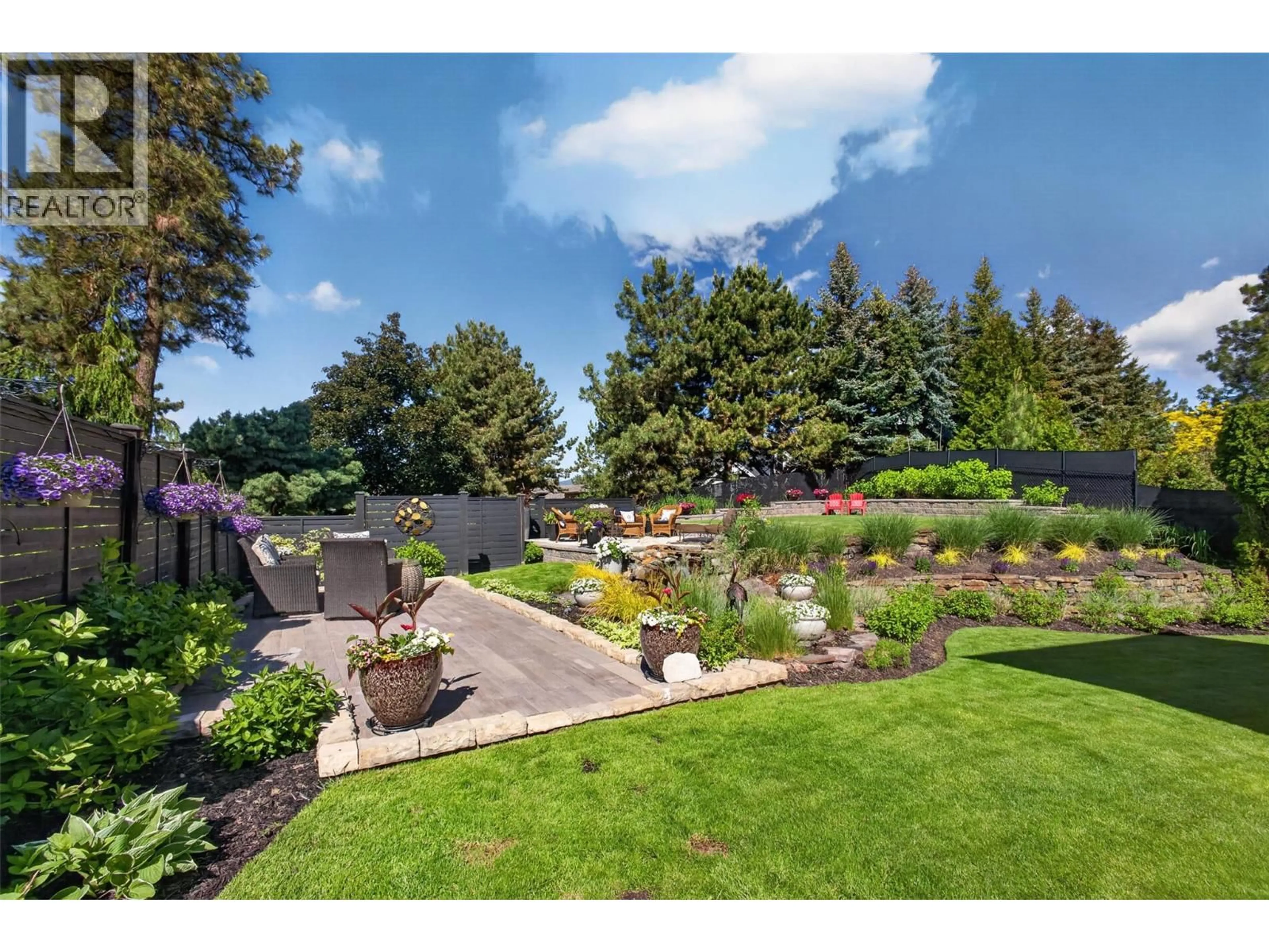 A pic from outside/outdoor area/front of a property/back of a property/a pic from drone, mountain view for 336 QUILCHENA DRIVE, Kelowna British Columbia V1W4Y9