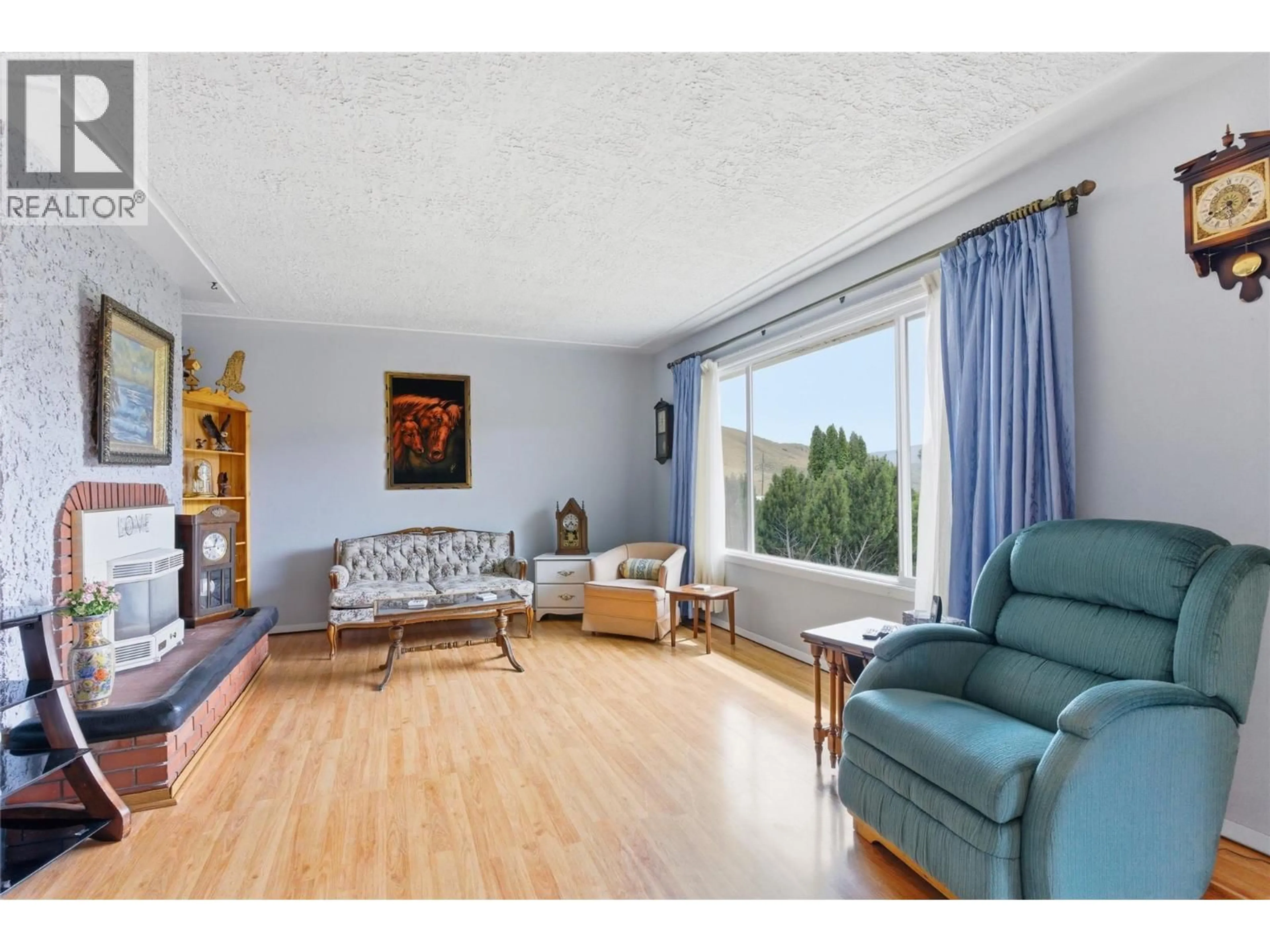 Living room with furniture, wood/laminate floor for 1332 MESA VISTA DRIVE, Ashcroft British Columbia V0K1A0