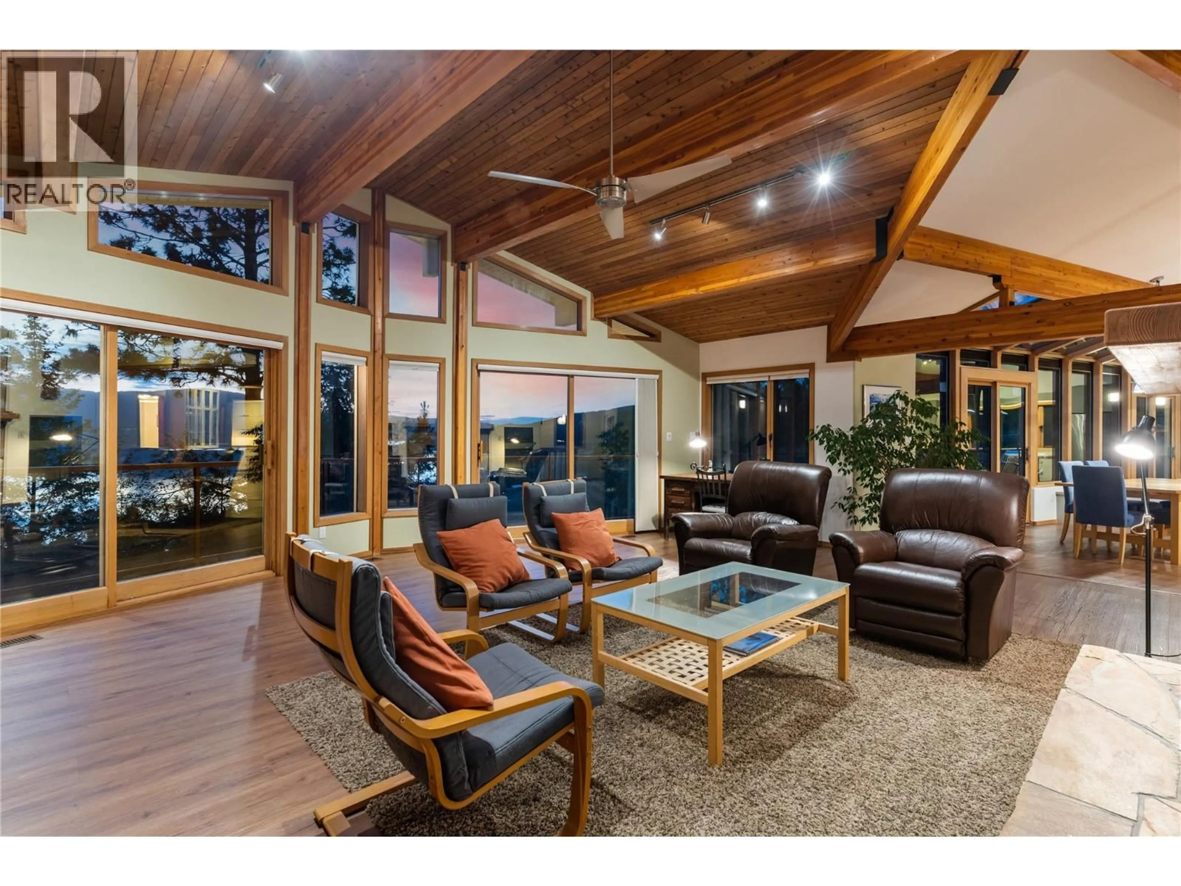 Living room with furniture, wood/laminate floor for 1279 CAMP ROAD, Lake Country British Columbia V4V1J9