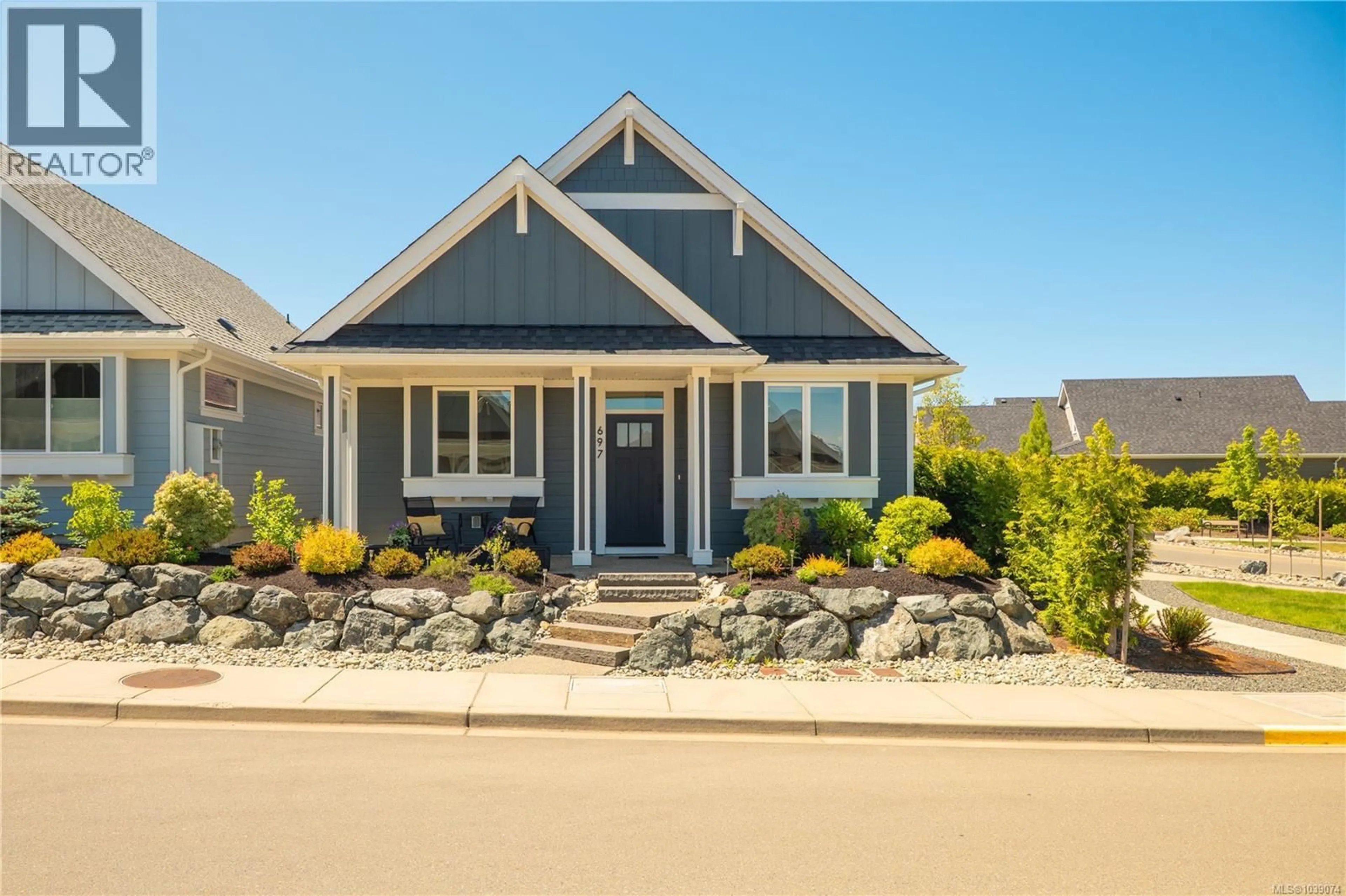 Home with vinyl exterior material, street for 697 BRIARWOOD DRIVE, Parksville British Columbia V9P0G5