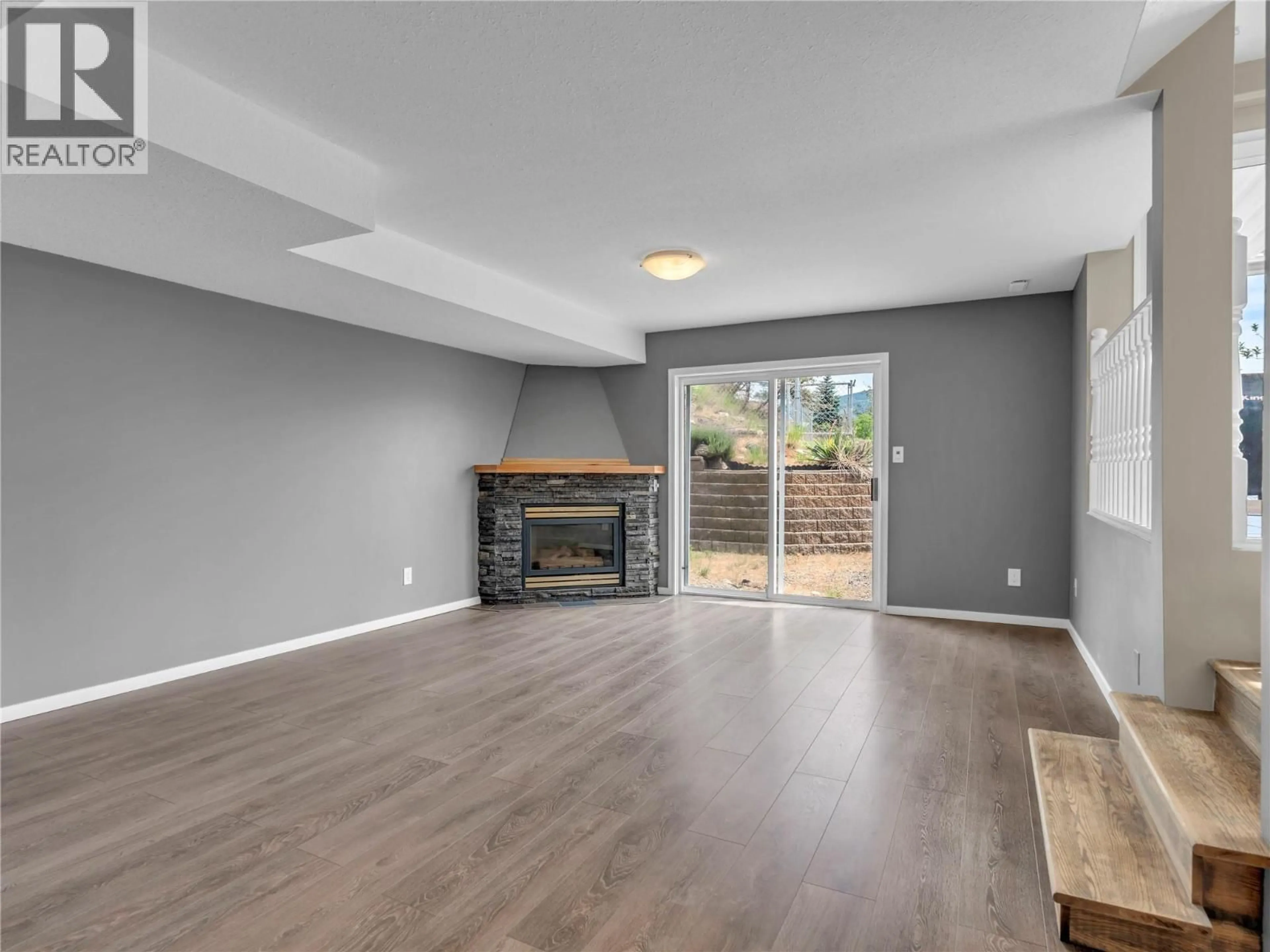 Living room with furniture, wood/laminate floor for 1357 PEACHCLIFF PLACE, Okanagan Falls British Columbia V0H1R1
