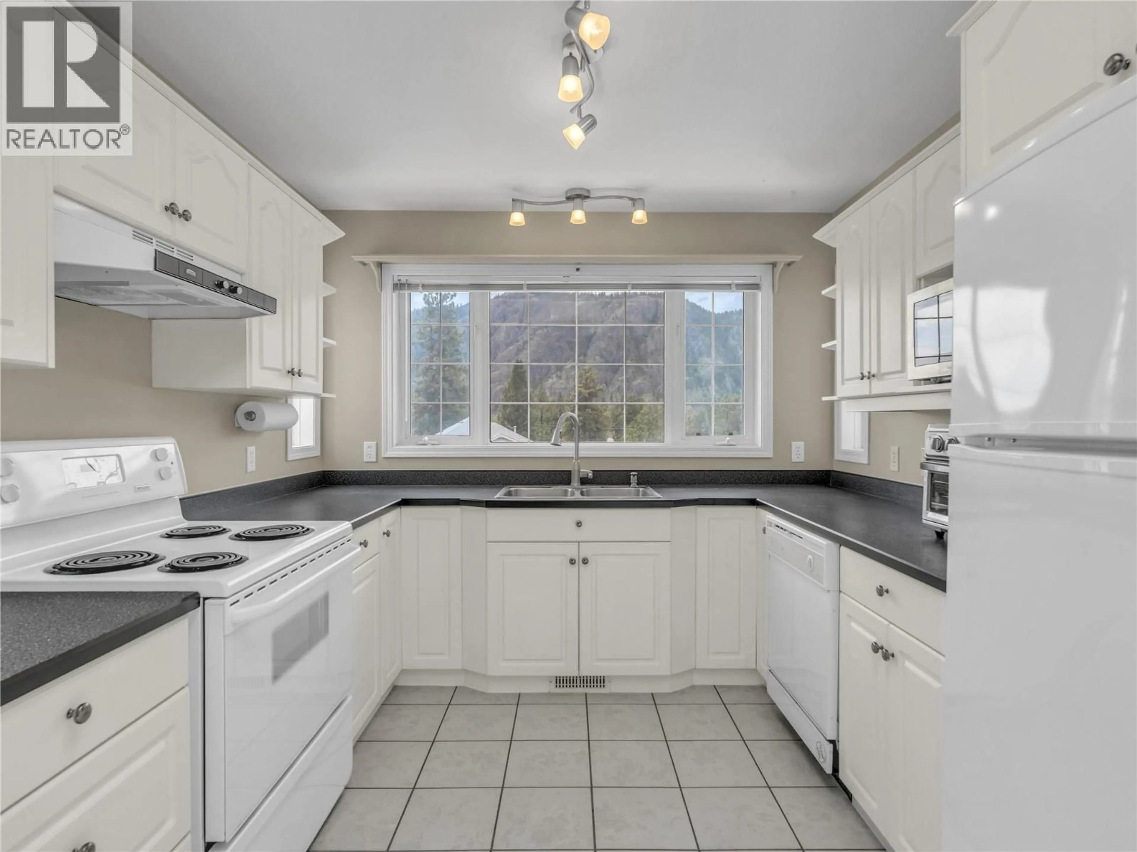 Standard kitchen, ceramic/tile floor for 1357 PEACHCLIFF PLACE, Okanagan Falls British Columbia V0H1R1