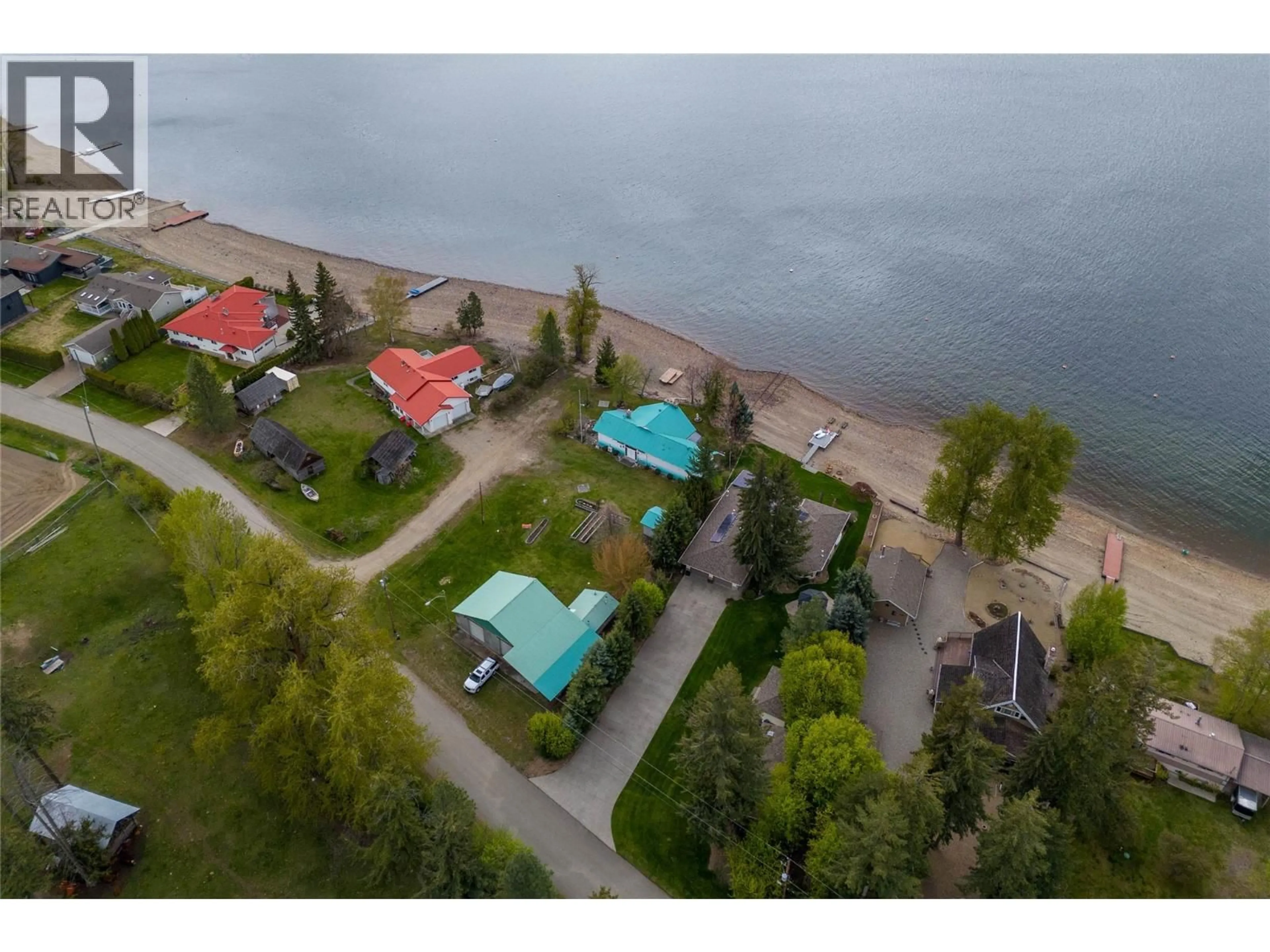 A pic from outside/outdoor area/front of a property/back of a property/a pic from drone, water/lake/river/ocean view for 3726 ZINCK ROAD, Scotch Creek British Columbia V0E1M5