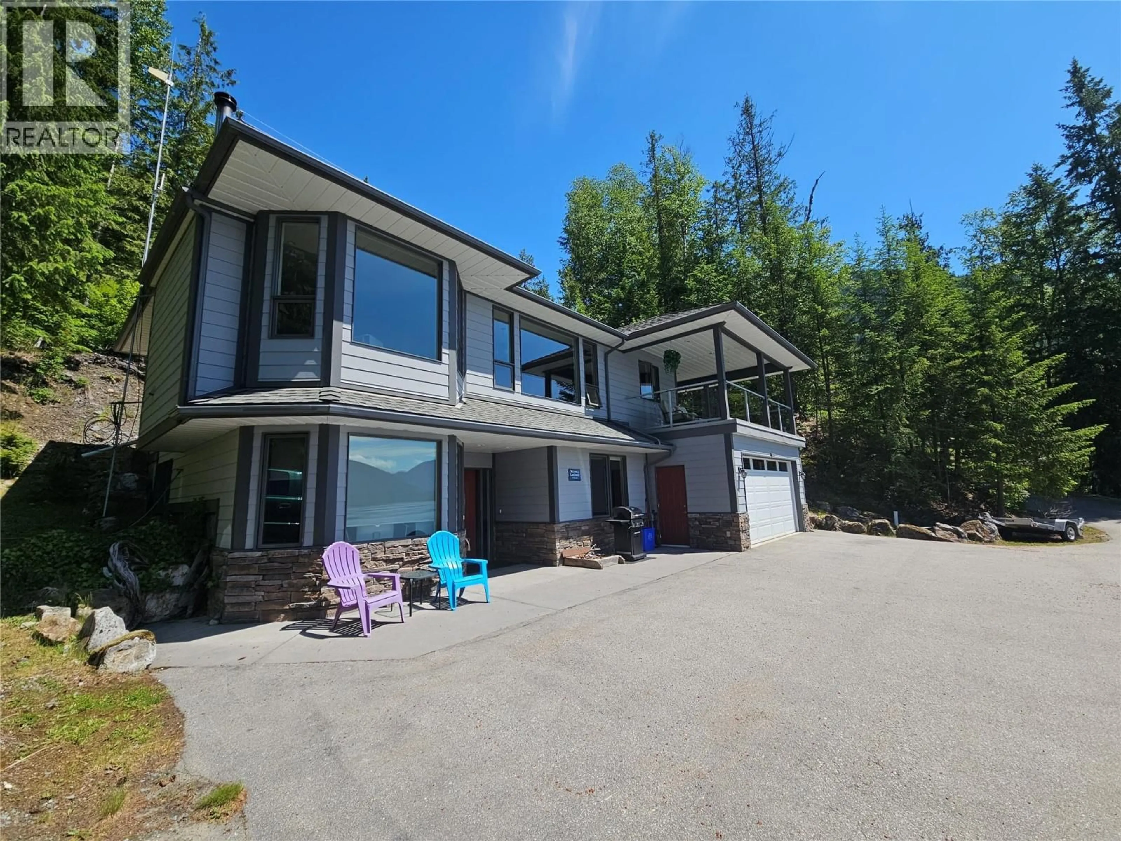 A pic from outside/outdoor area/front of a property/back of a property/a pic from drone, unknown for 1710 6 HIGHWAY, Nakusp British Columbia V0G1R1