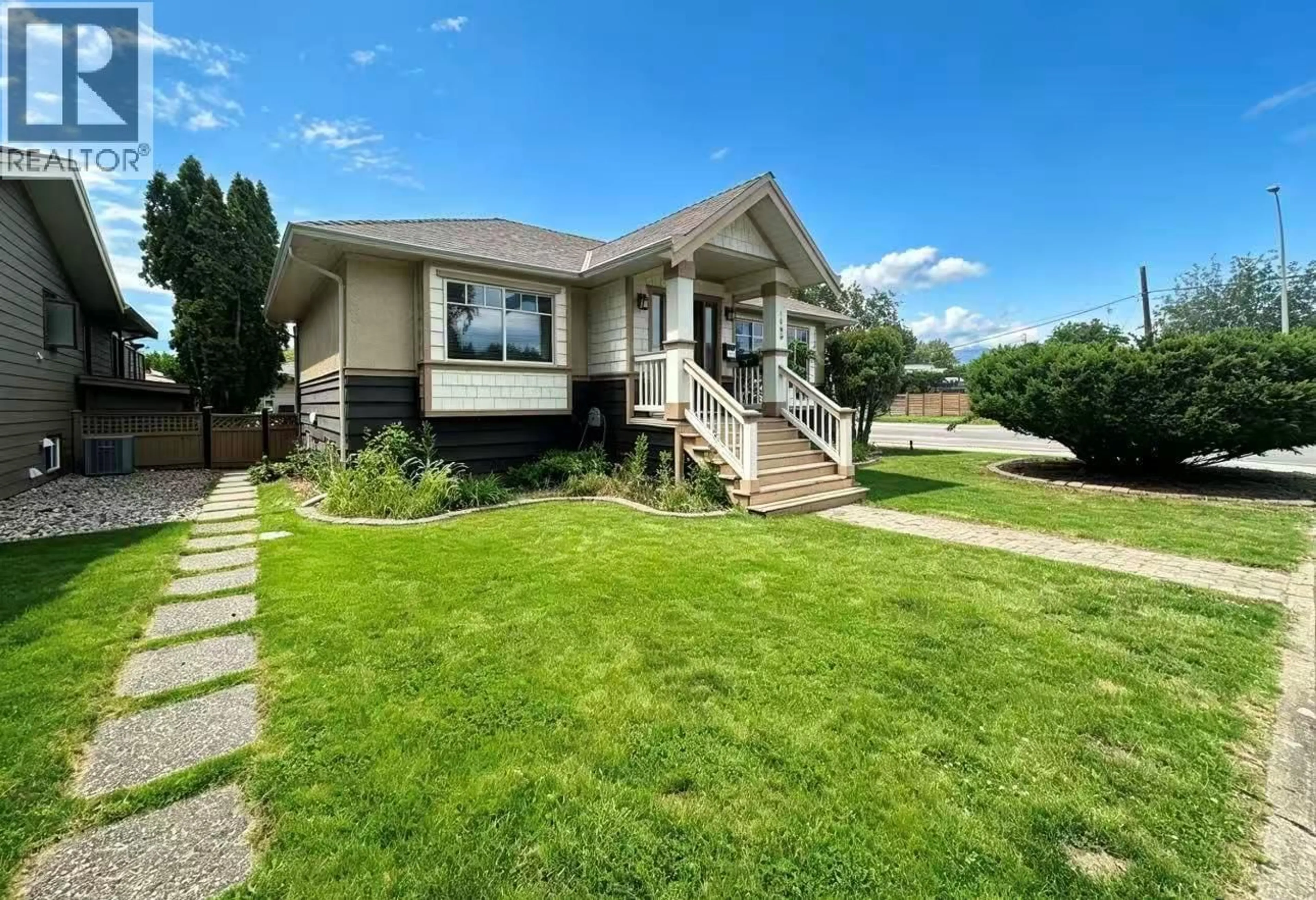 A pic from outside/outdoor area/front of a property/back of a property/a pic from drone, street for 1906 CARRUTHERS STREET, Kelowna British Columbia V1Y3B8