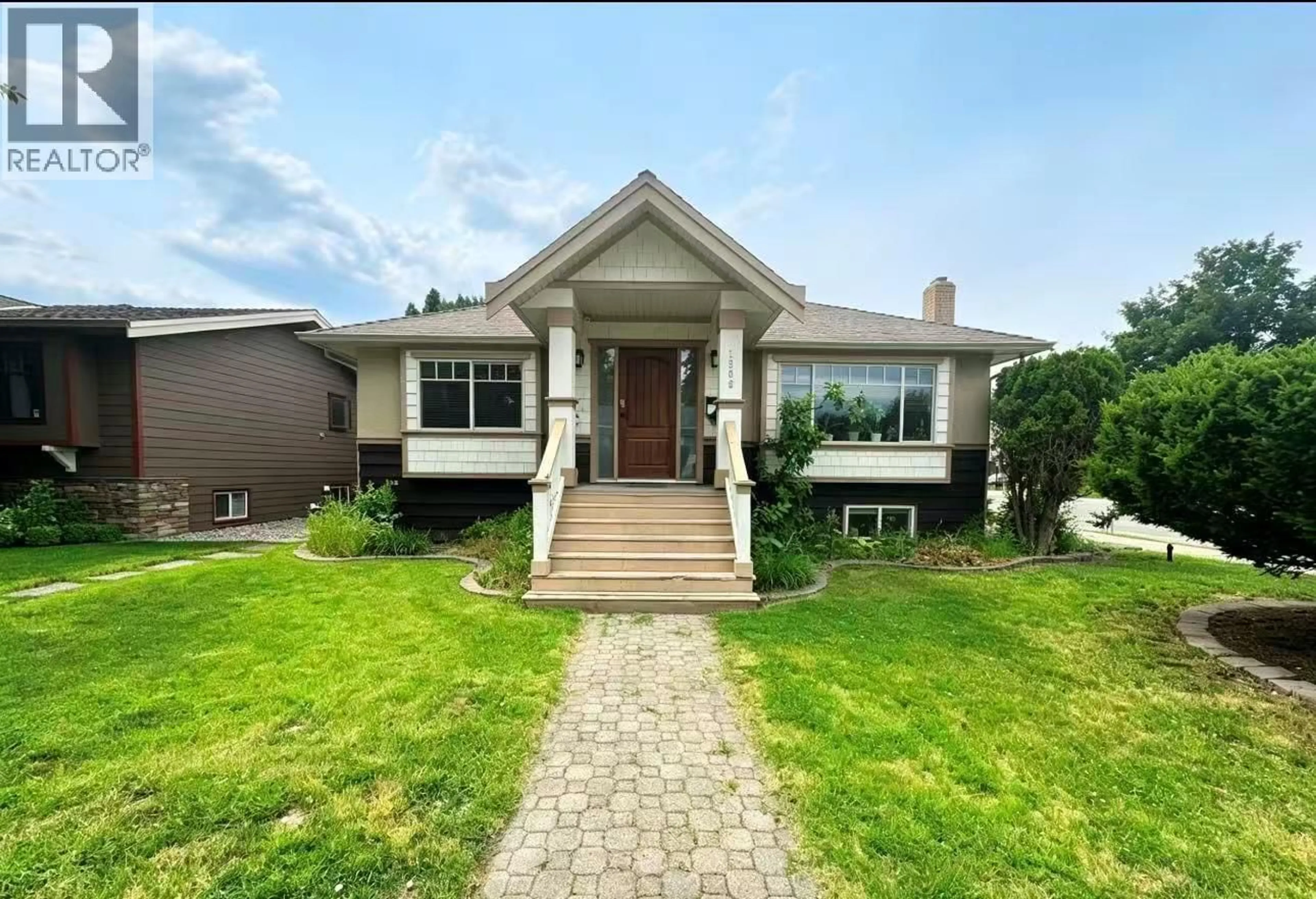 Home with brick exterior material, street for 1906 CARRUTHERS STREET, Kelowna British Columbia V1Y3B8