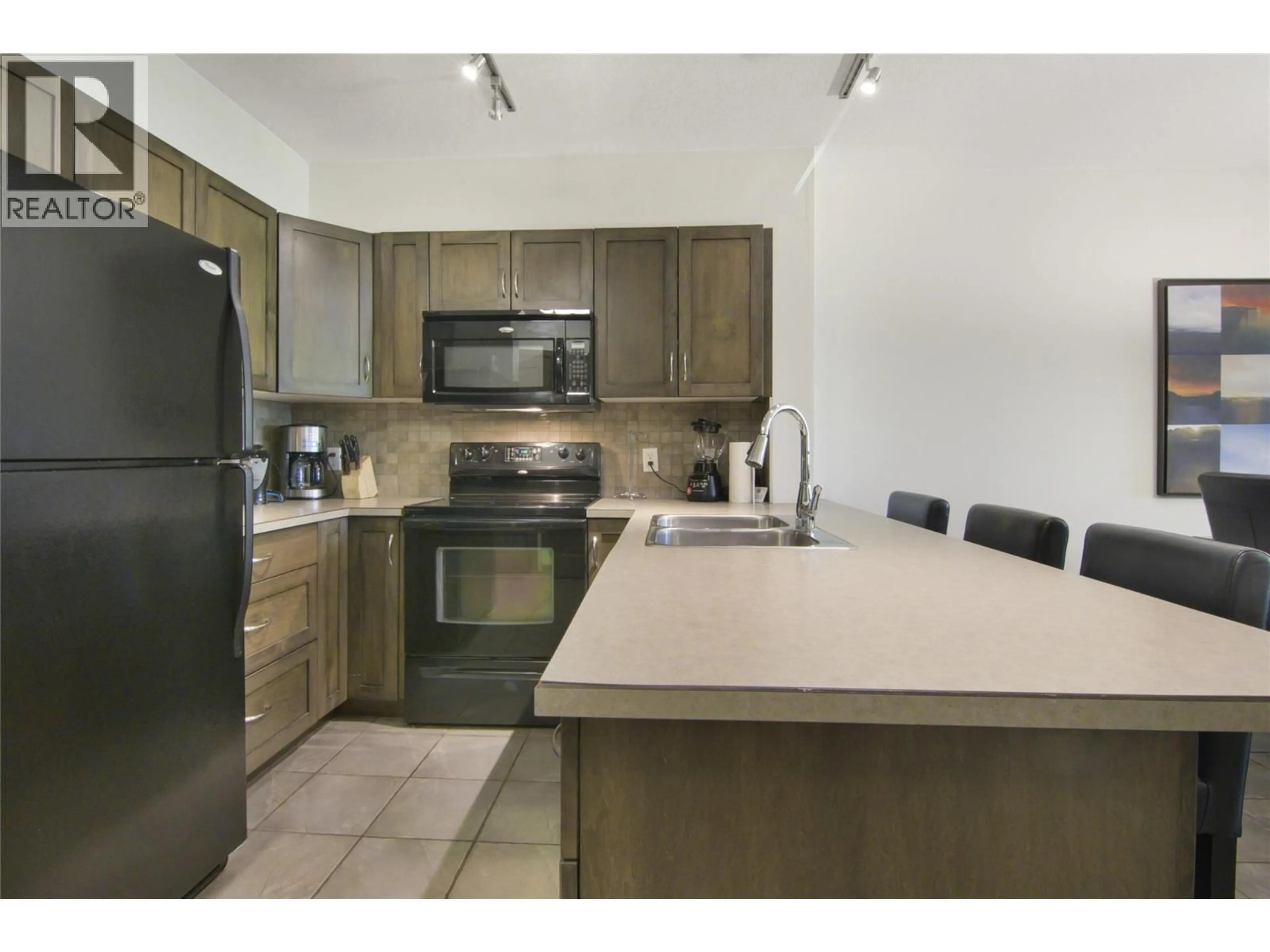 Standard kitchen, ceramic/tile floor for 238 - 654 COOK ROAD, Kelowna British Columbia V1W3G7