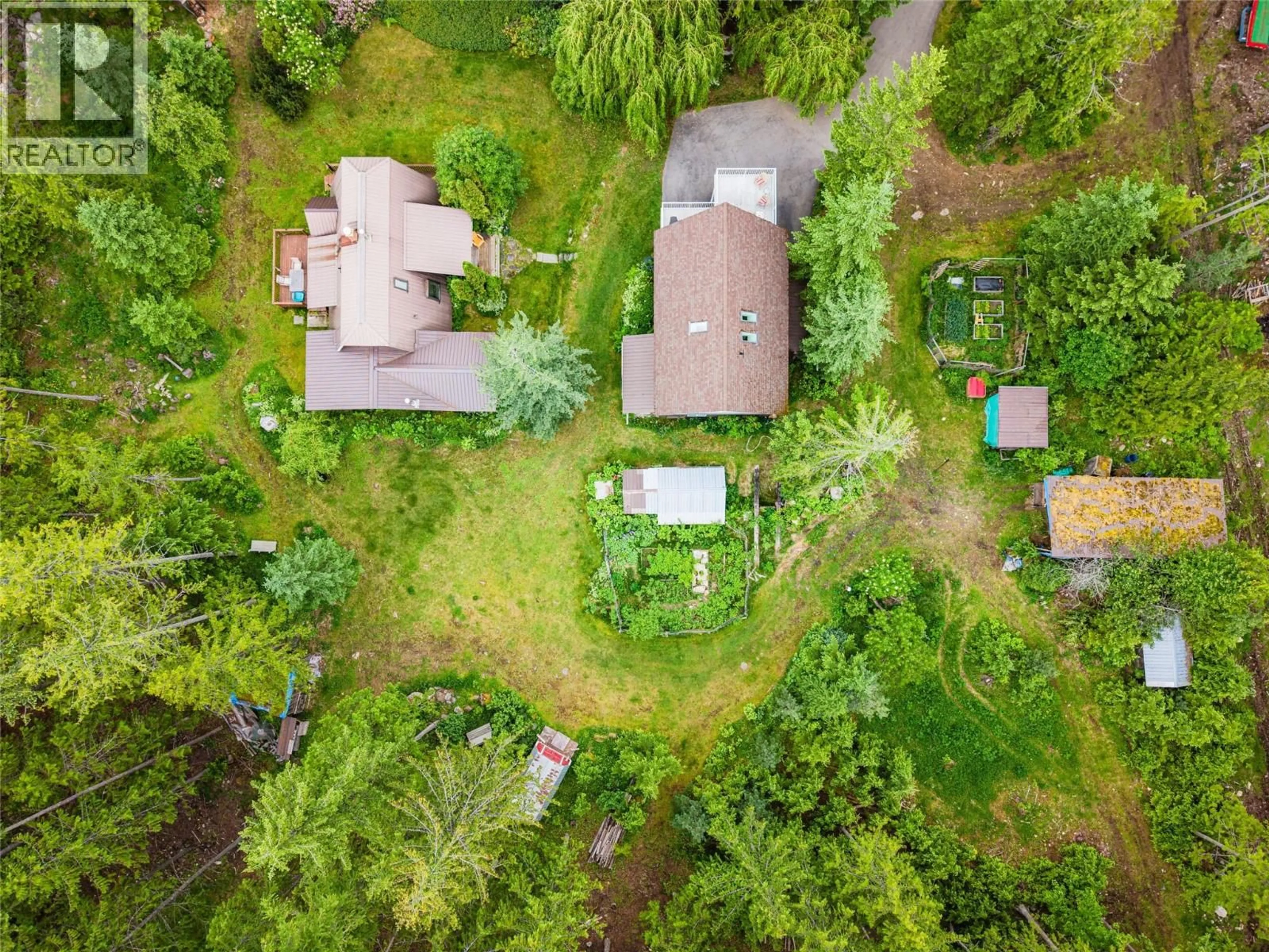 A pic from outside/outdoor area/front of a property/back of a property/a pic from drone, forest/trees view for 7346 HARROP PROCTER ROAD, Procter British Columbia V1L6R4