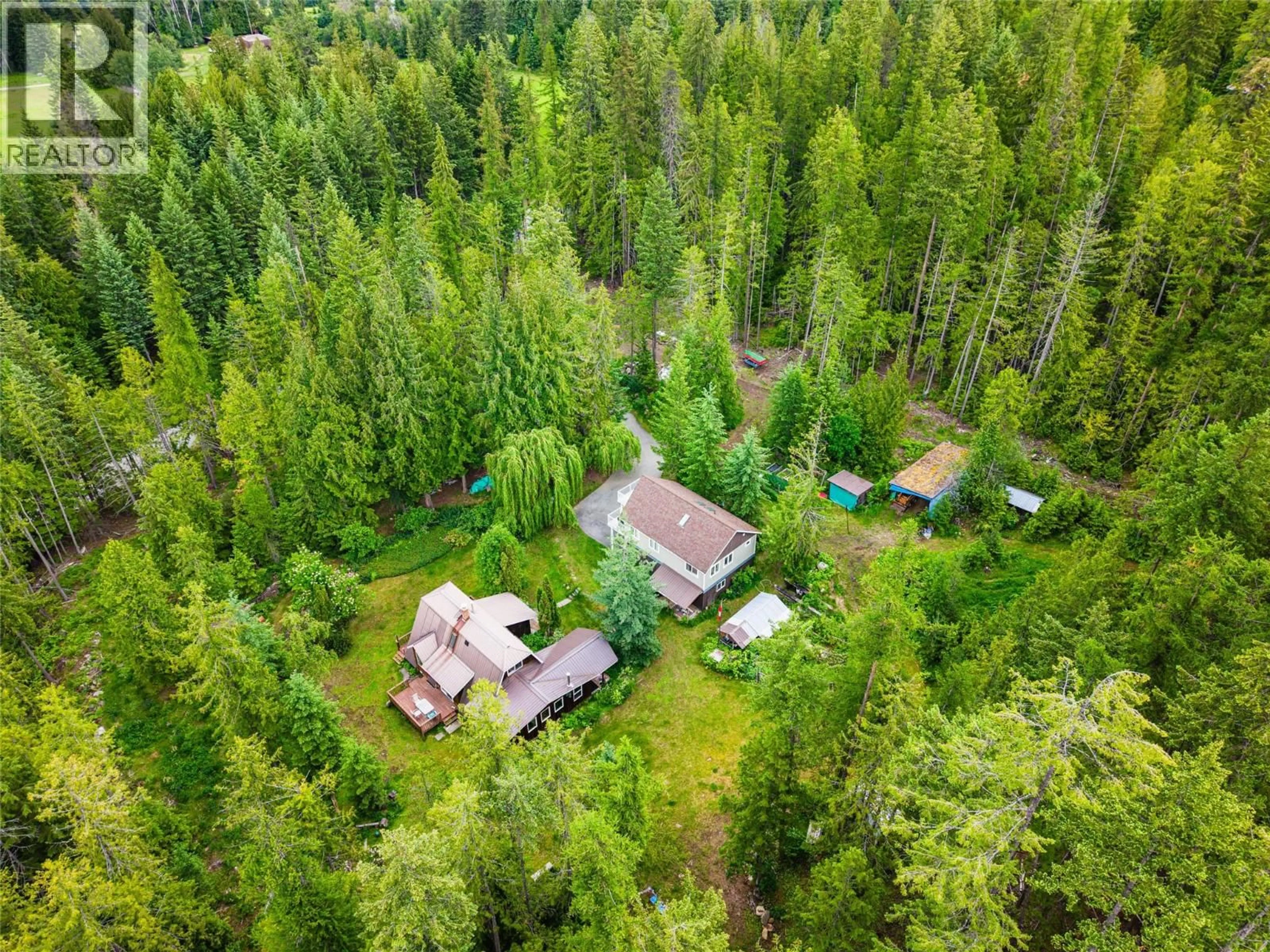 A pic from outside/outdoor area/front of a property/back of a property/a pic from drone, forest/trees view for 7346 HARROP PROCTER ROAD, Procter British Columbia V1L6R4