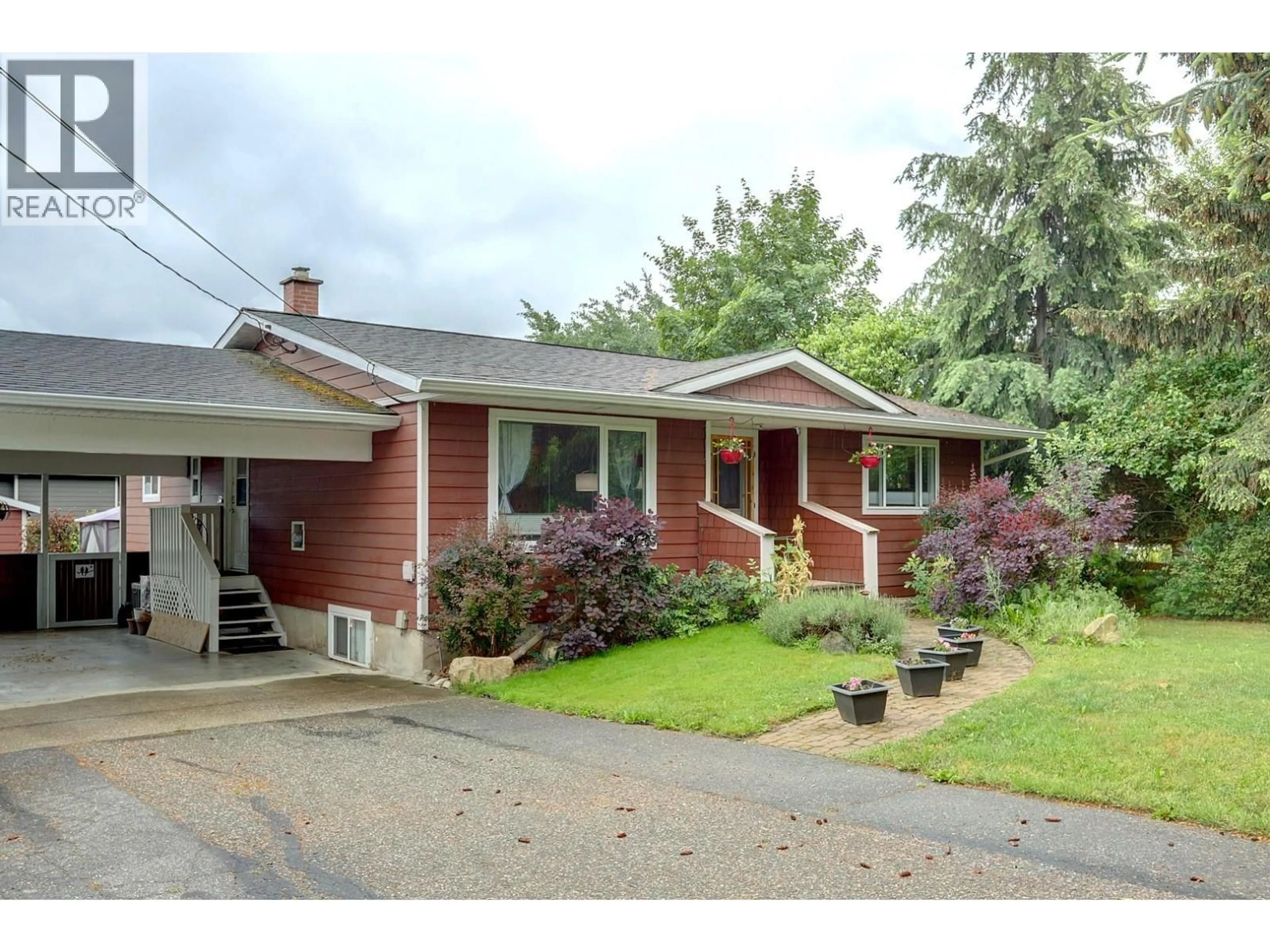 Home with vinyl exterior material, street for 3230 FRASER ROAD, Armstrong British Columbia V4Y0J9