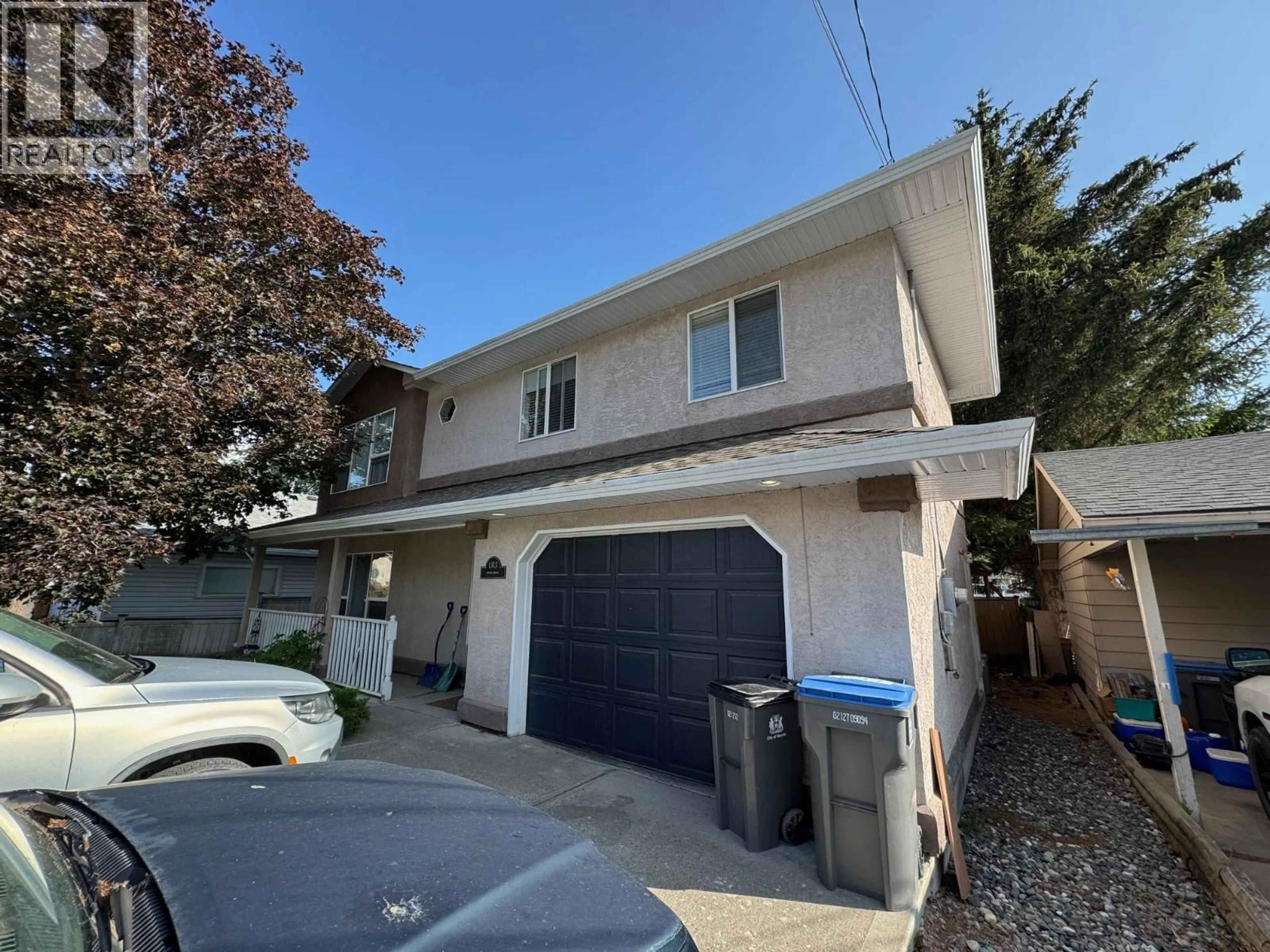 Home with vinyl exterior material, street for 1313 SPRUCE AVENUE, Merritt British Columbia V1K1L2