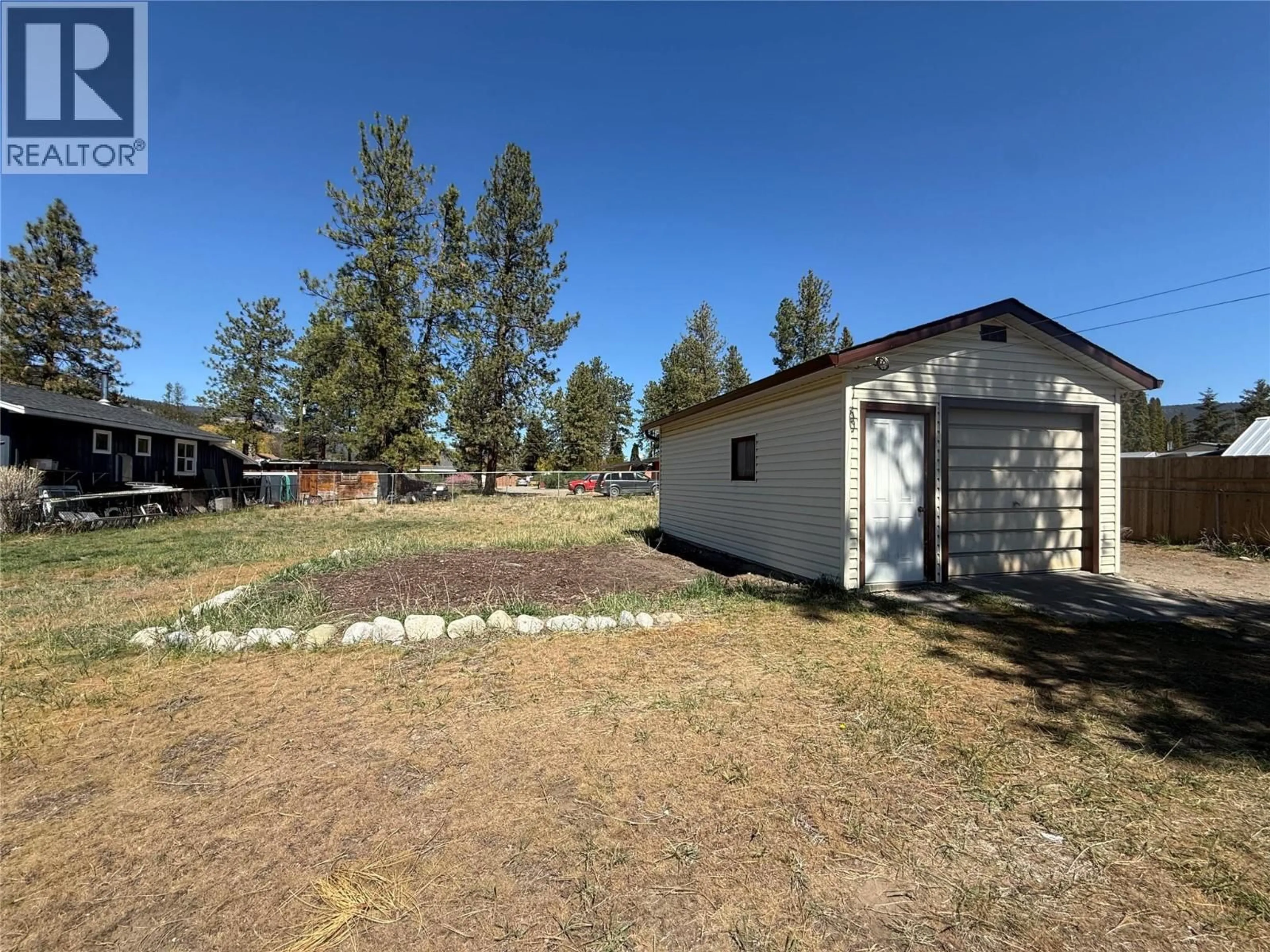 A pic from outside/outdoor area/front of a property/back of a property/a pic from drone, unknown for 435 BARWICK AVENUE, Merritt British Columbia V0K1Y0
