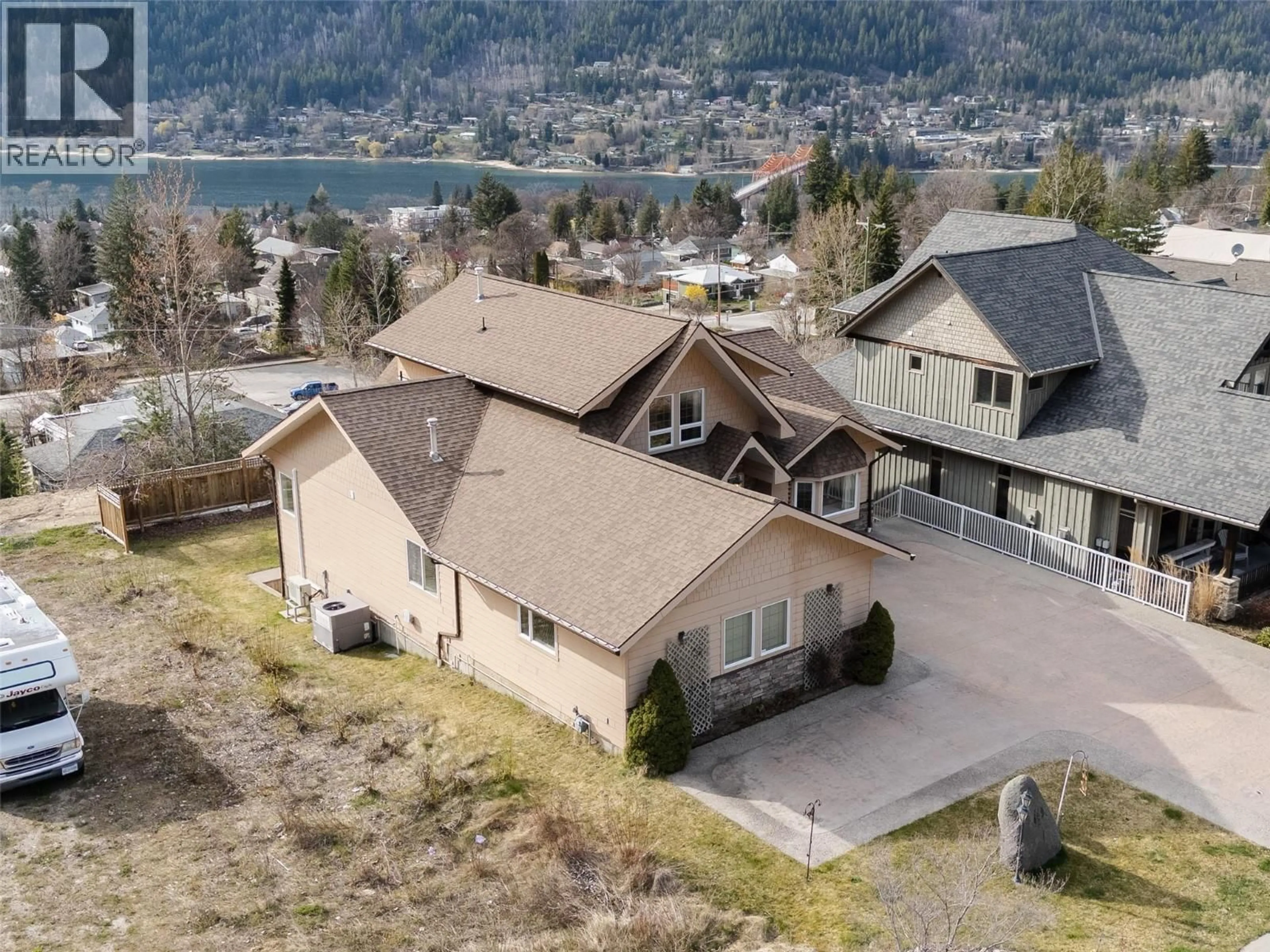 A pic from outside/outdoor area/front of a property/back of a property/a pic from drone, mountain view for 449 HAMPTON GRAY PLACE, Nelson British Columbia V1L7A8