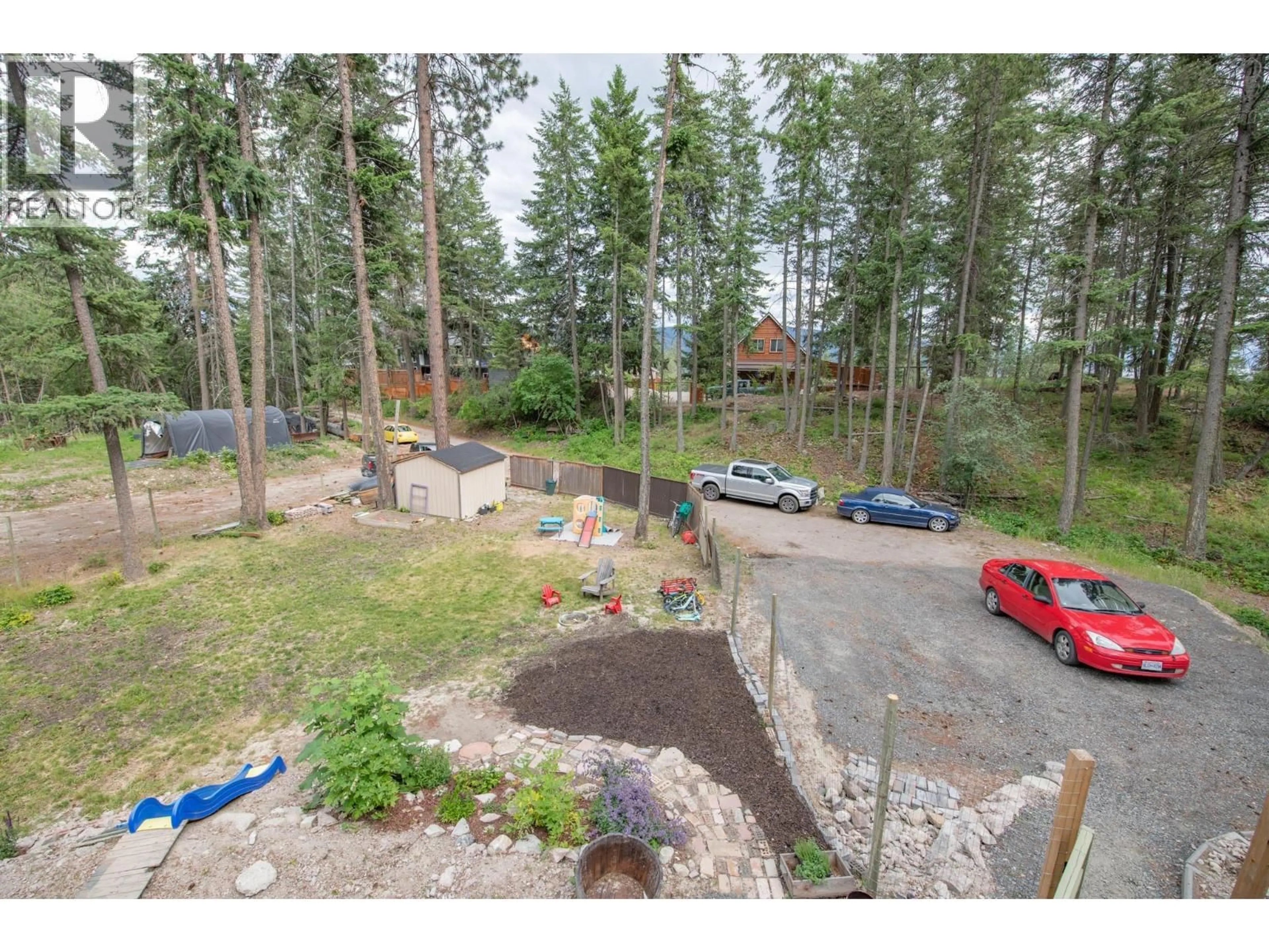 A pic from outside/outdoor area/front of a property/back of a property/a pic from drone, forest/trees view for 9535 KEITHLEY ROAD, Vernon British Columbia V1H2E5