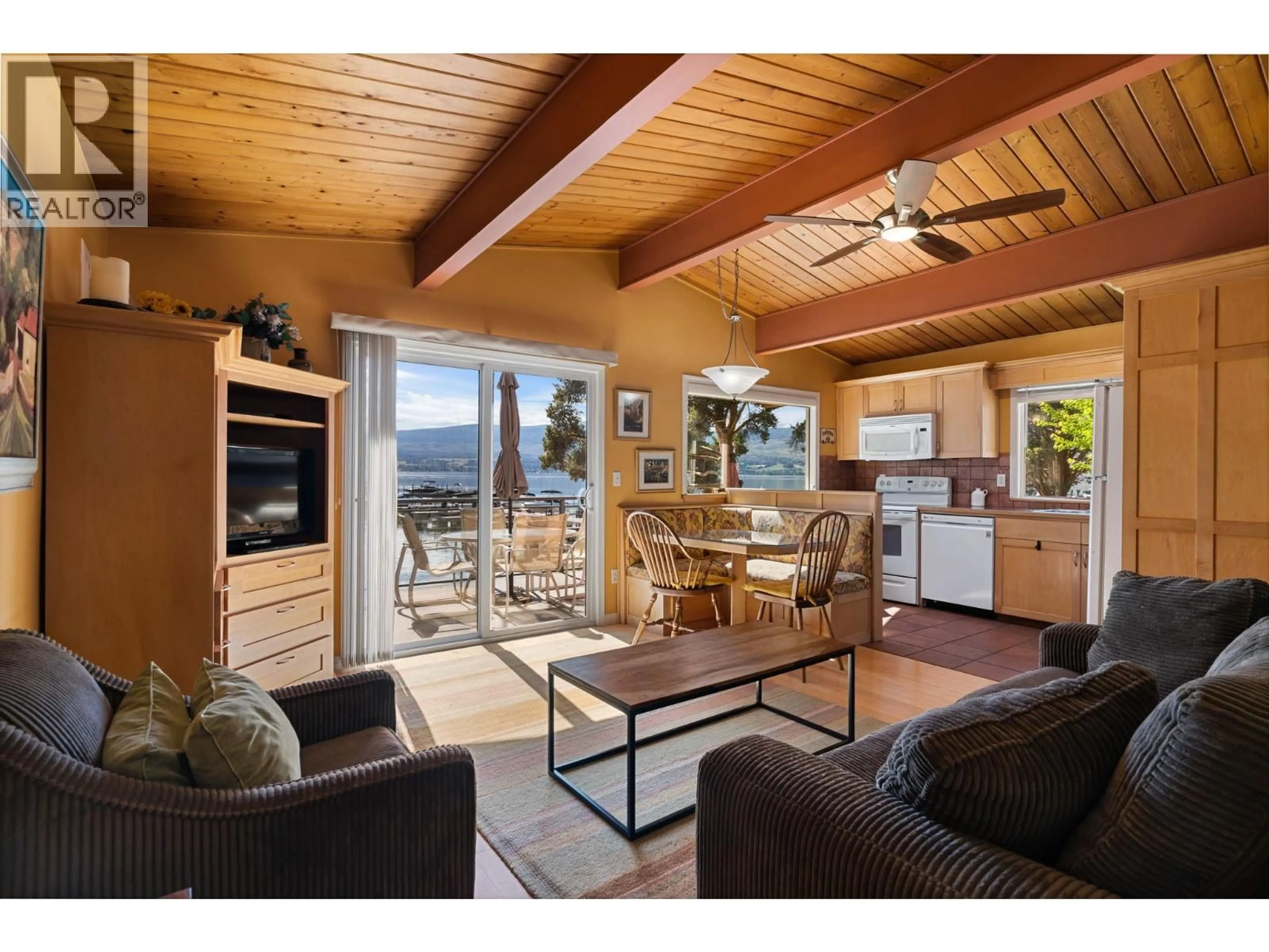 Living room with furniture, wood/laminate floor for 405 - 2777 CASA LOMA ROAD, West Kelowna British Columbia V1Z1T6