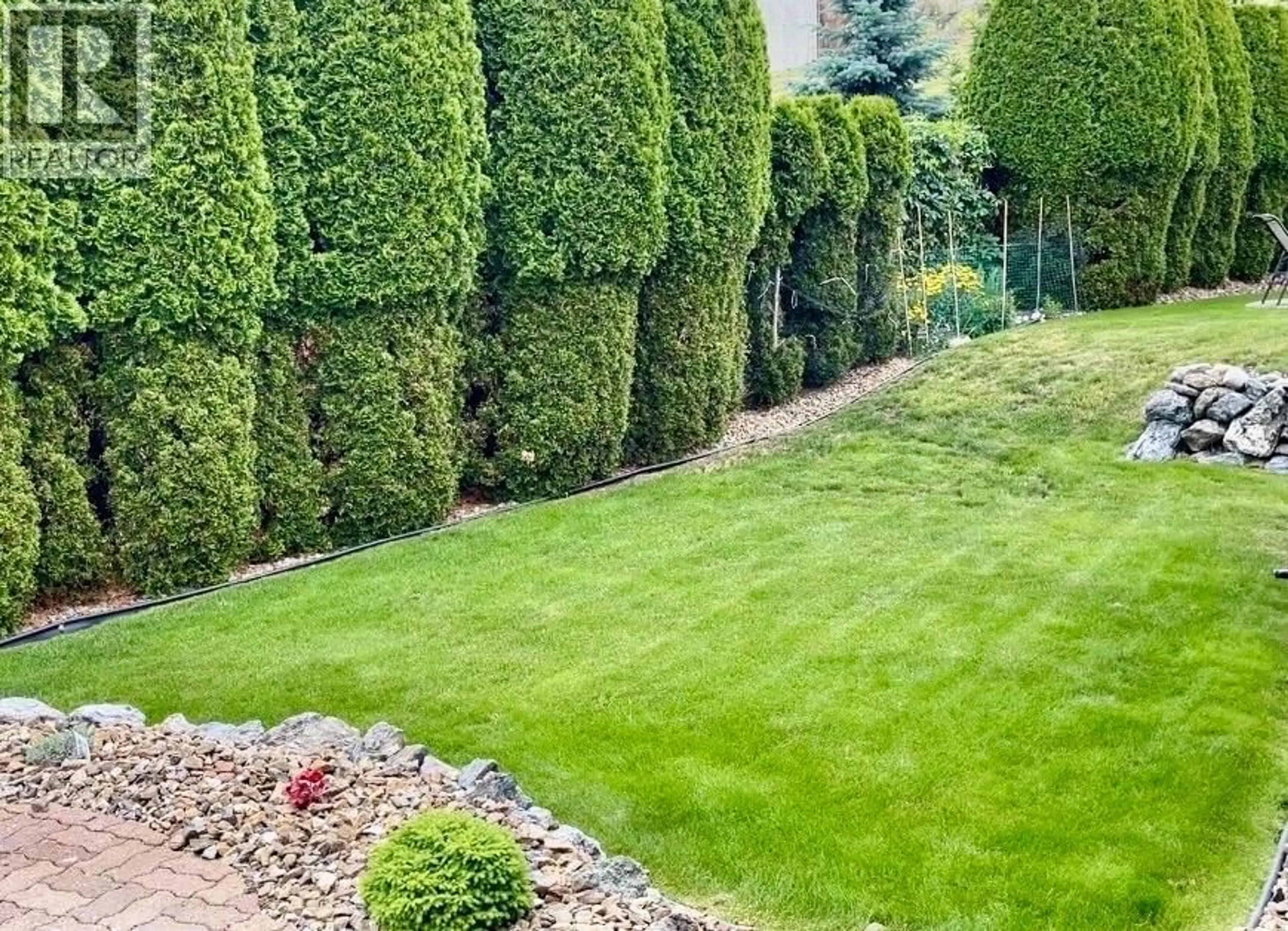 A pic from outside/outdoor area/front of a property/back of a property/a pic from drone, forest/trees view for 60 - 124 SARSONS ROAD, Vernon British Columbia V1B2T9