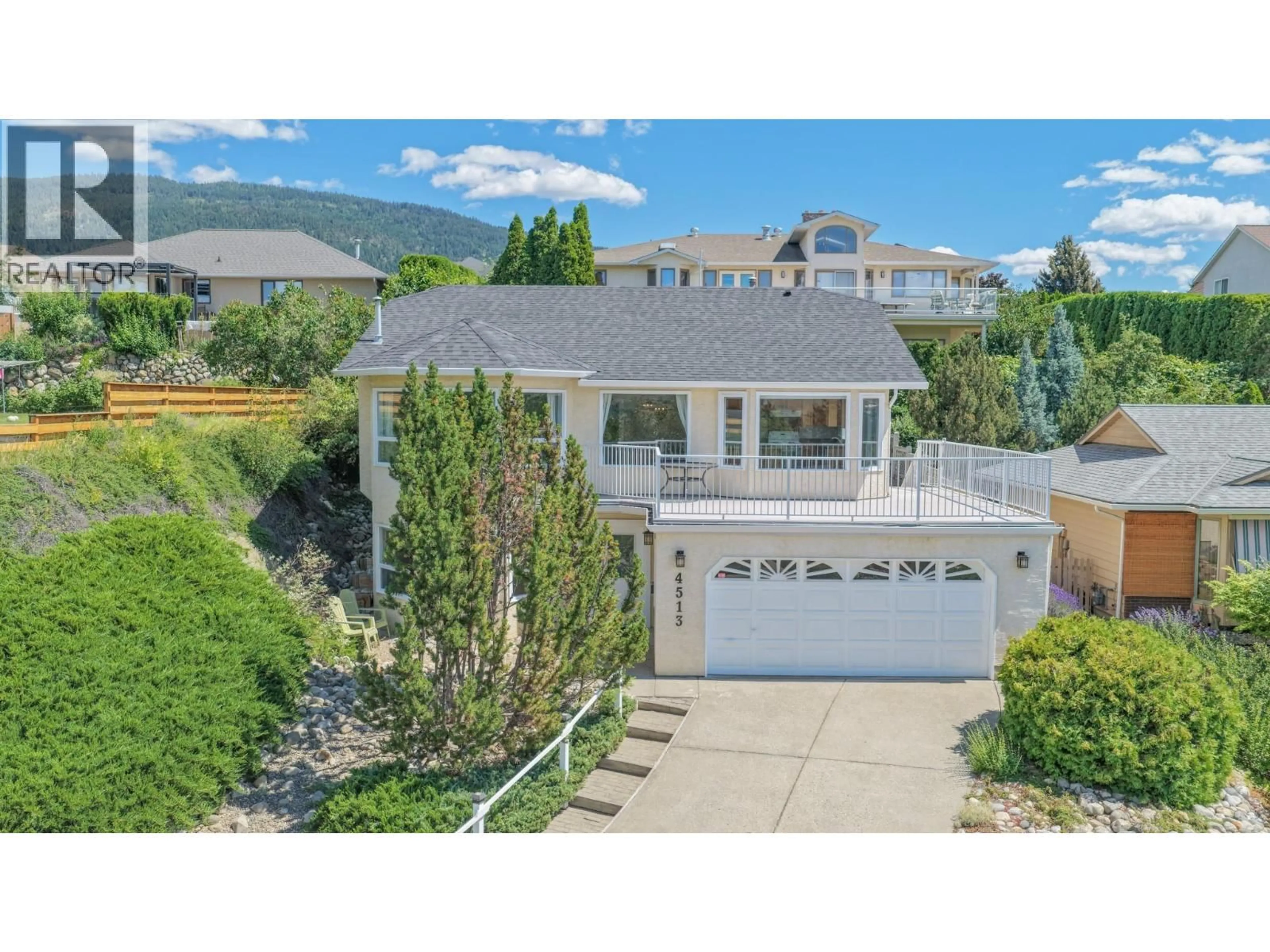 A pic from outside/outdoor area/front of a property/back of a property/a pic from drone, mountain view for 4513 CASCADE DRIVE, Vernon British Columbia V1T8J7