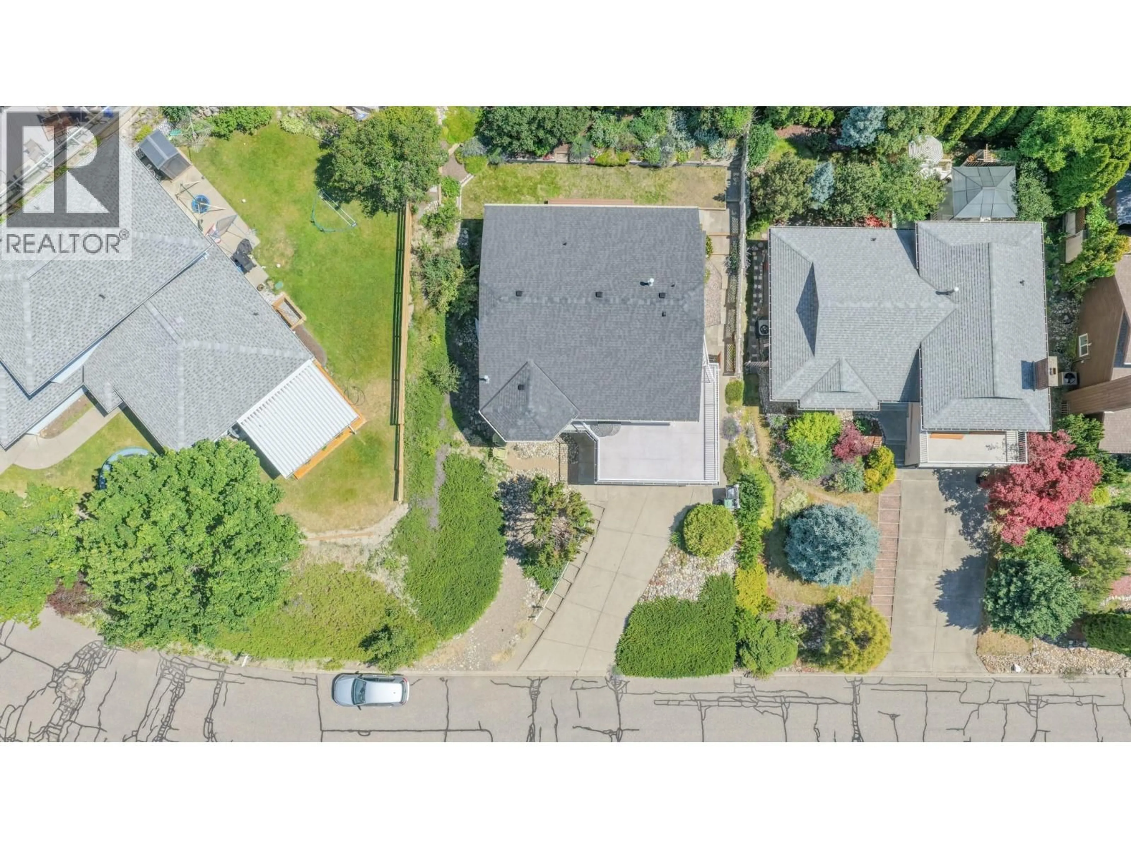 A pic from outside/outdoor area/front of a property/back of a property/a pic from drone, street for 4513 CASCADE DRIVE, Vernon British Columbia V1T8J7