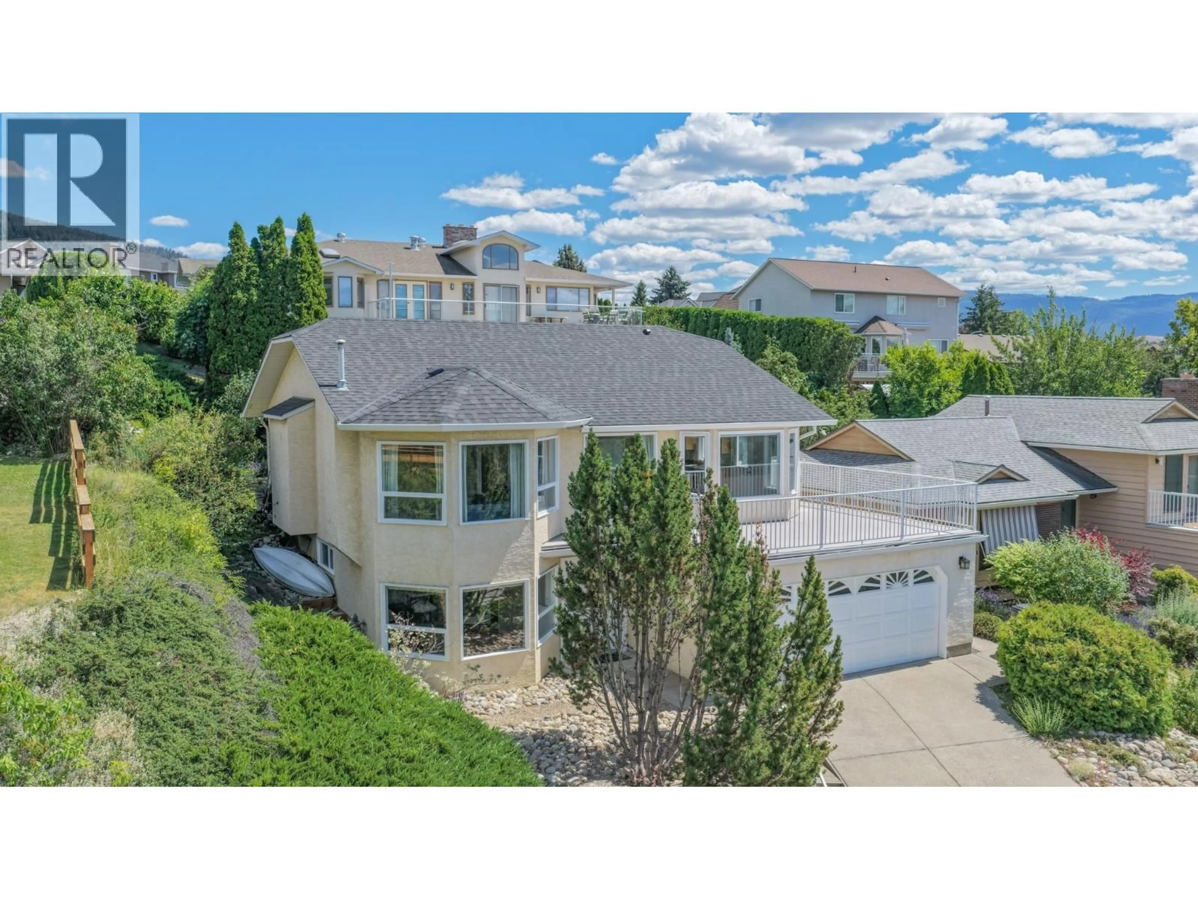 A pic from outside/outdoor area/front of a property/back of a property/a pic from drone, street for 4513 CASCADE DRIVE, Vernon British Columbia V1T8J7