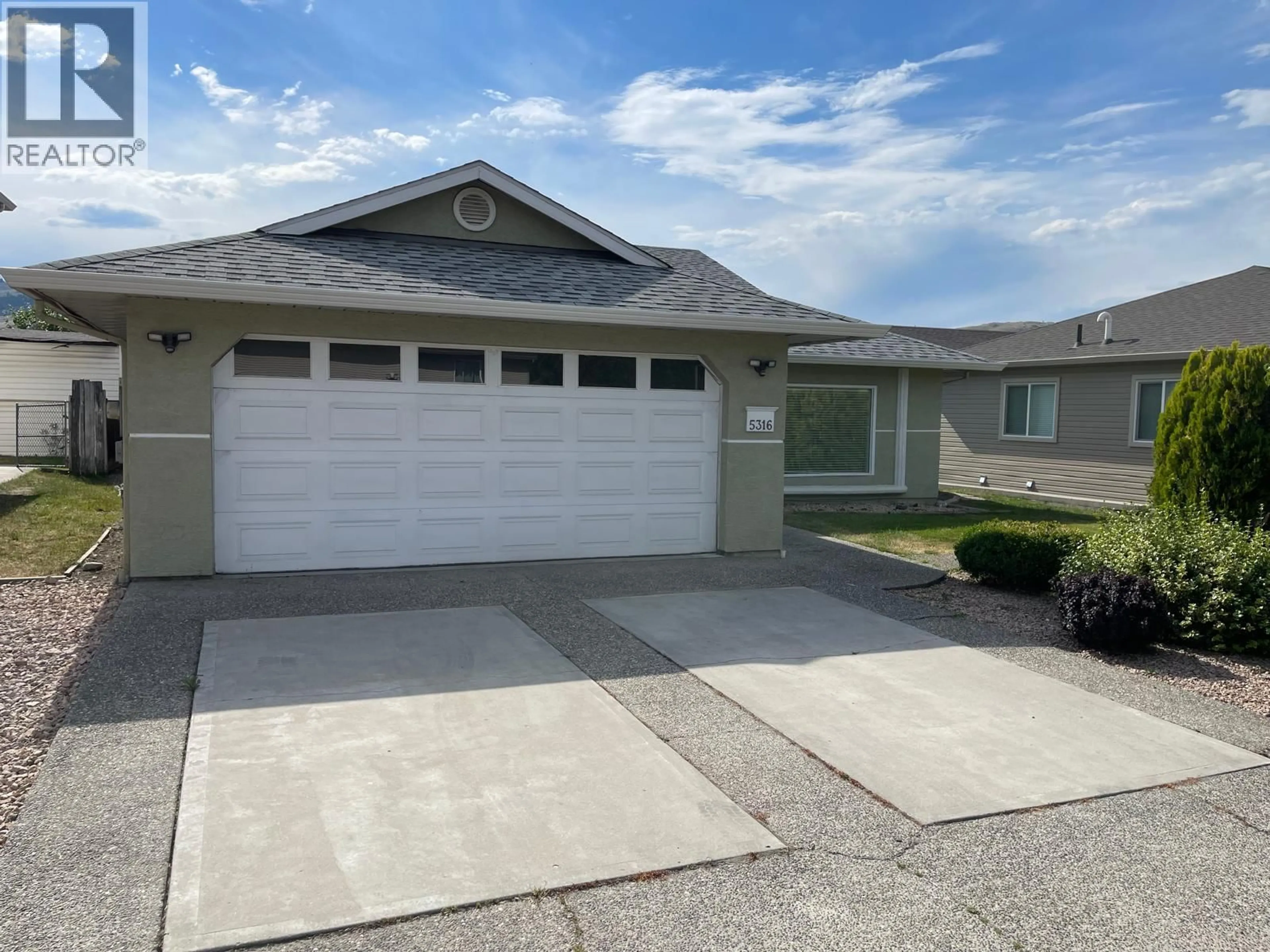 Home with vinyl exterior material, street for 5316 21 STREET, Vernon British Columbia V1T9N2