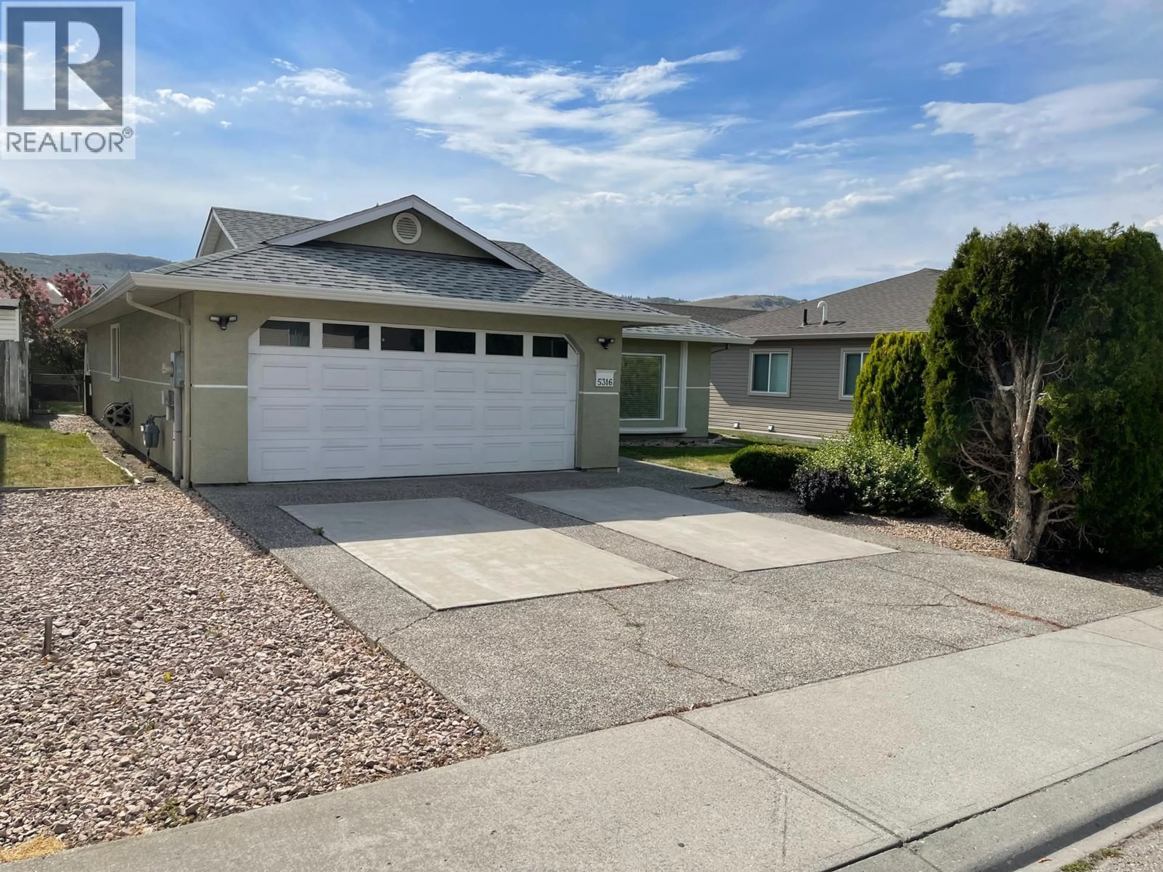 Home with vinyl exterior material, street for 5316 21 STREET, Vernon British Columbia V1T9N2