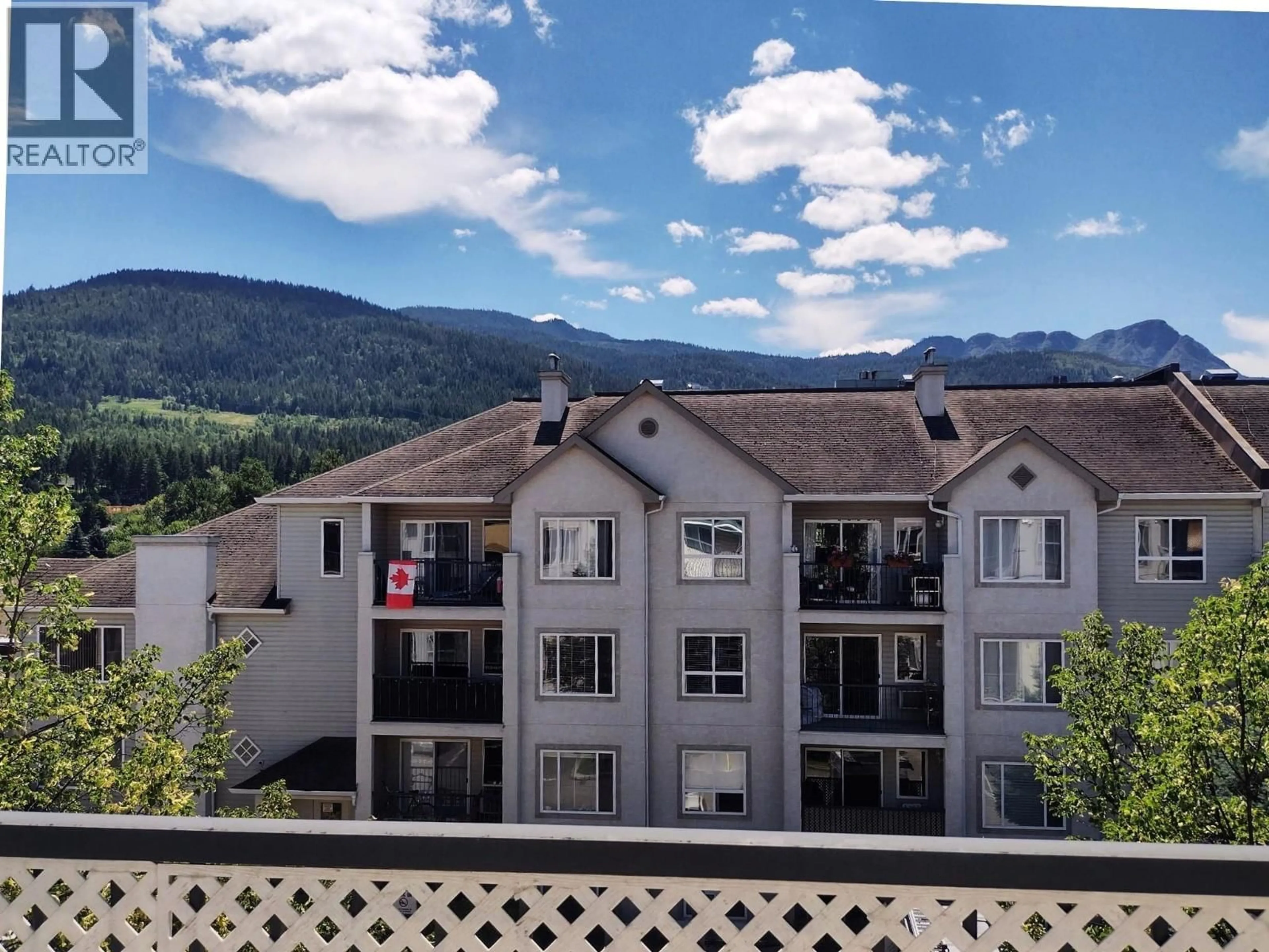 A pic from outside/outdoor area/front of a property/back of a property/a pic from drone, mountain view for 406 - 640 3 STREET SOUTHWEST, Salmon Arm British Columbia V1E2R3