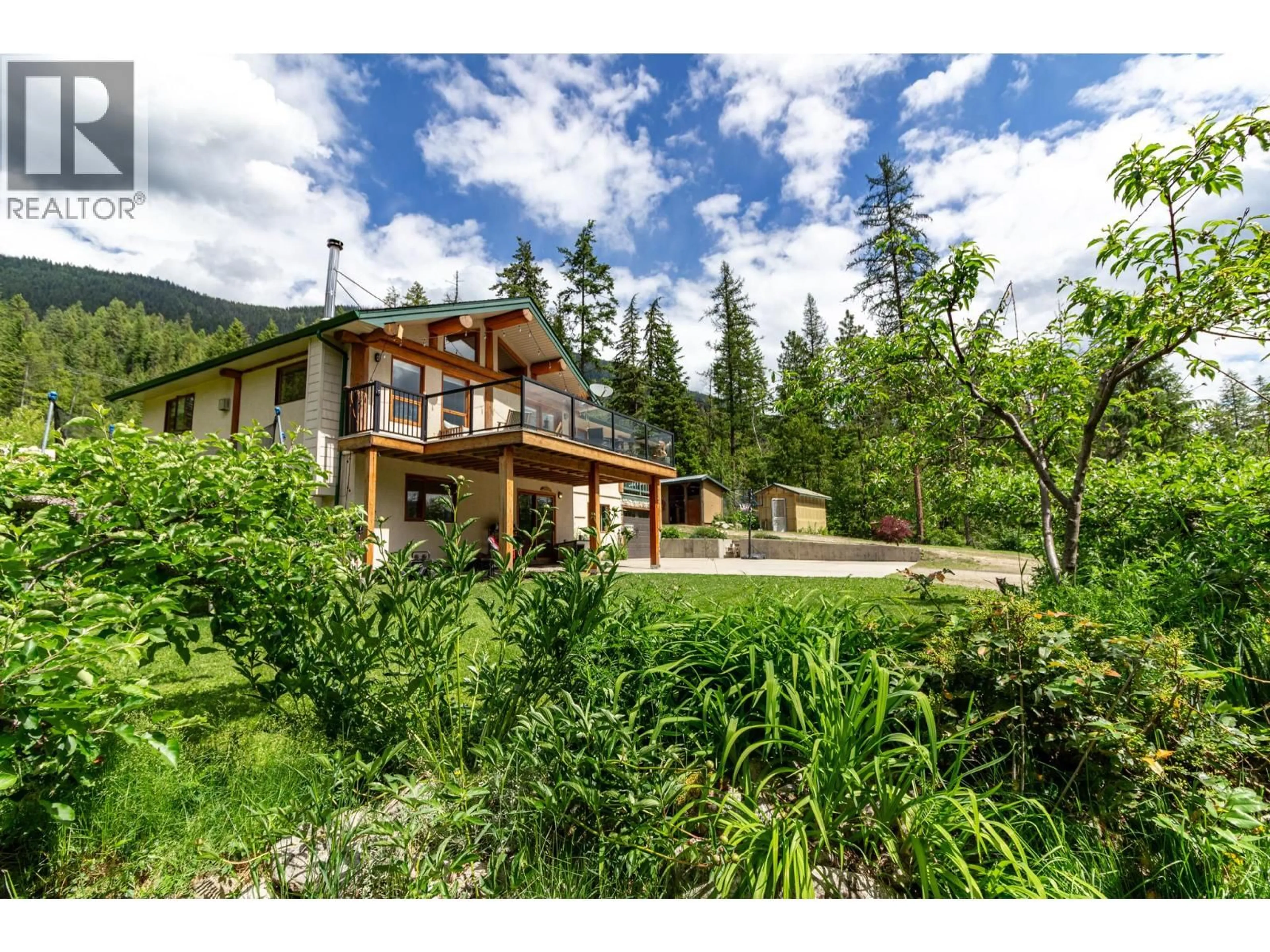 A pic from outside/outdoor area/front of a property/back of a property/a pic from drone, mountain view for 3975 HIGHWAY 3A HIGHWAY, Nelson British Columbia V1L6M8