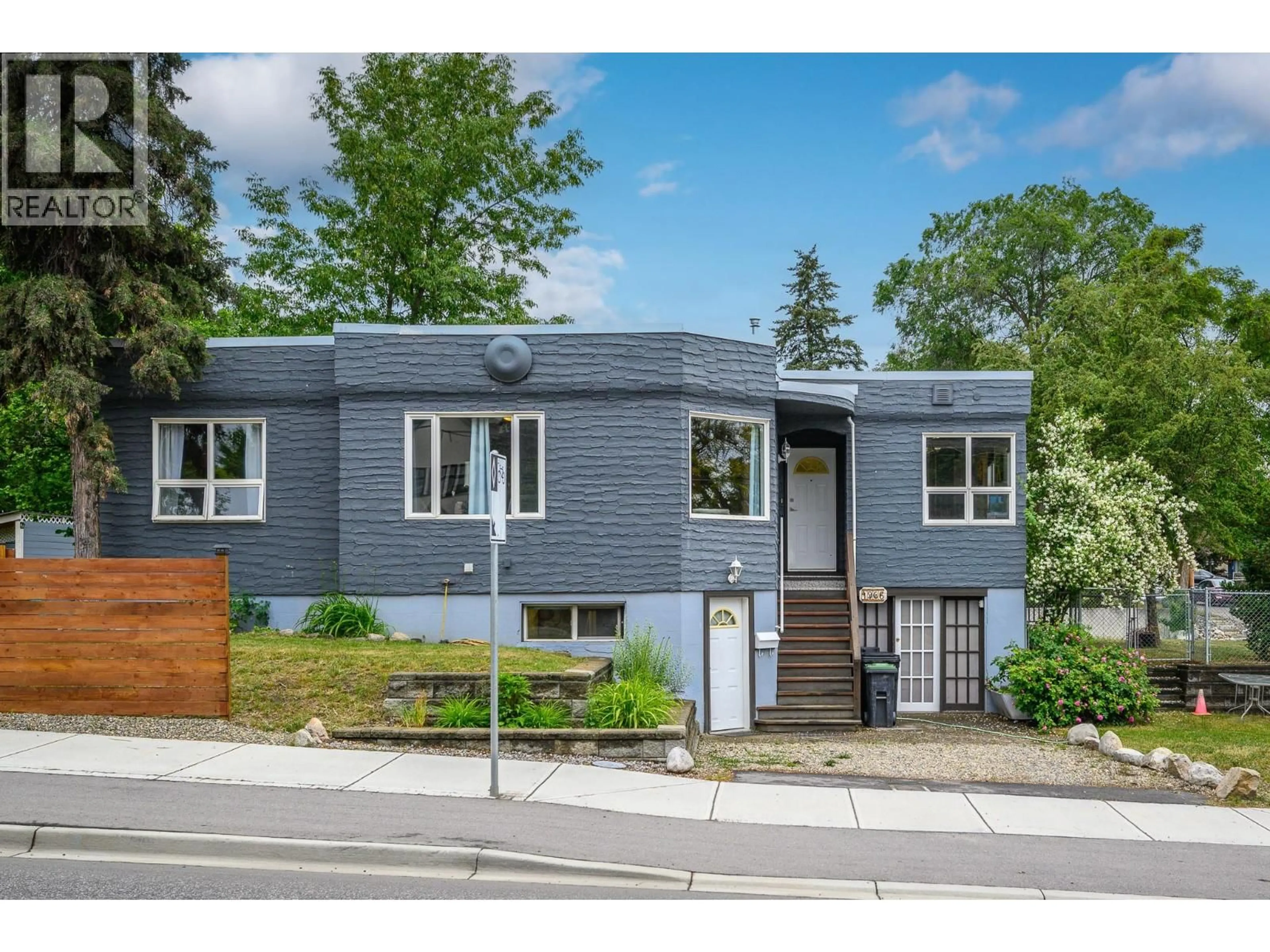 Home with vinyl exterior material, street for 1906 32 AVENUE, Vernon British Columbia V1T2J7