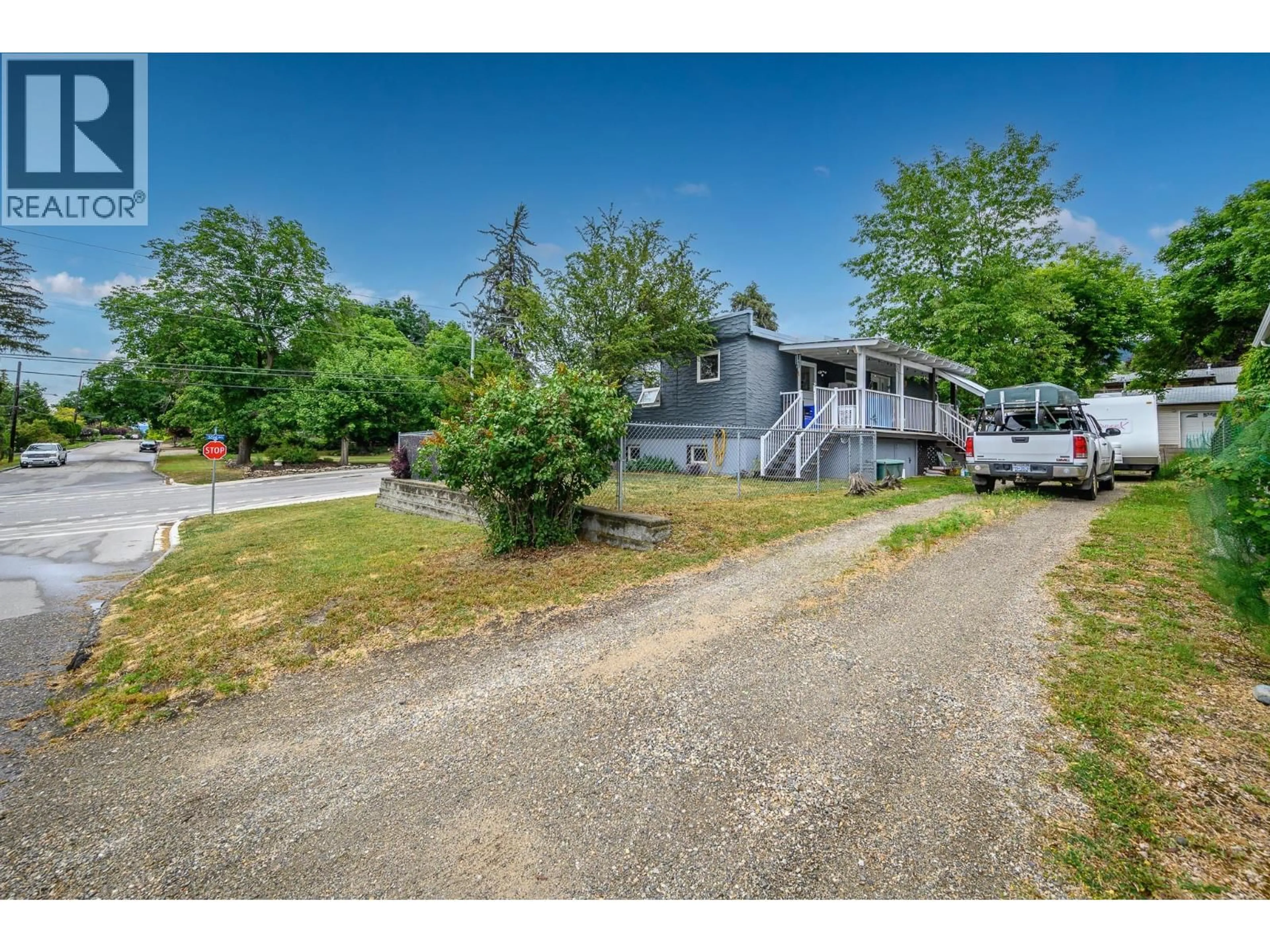 A pic from outside/outdoor area/front of a property/back of a property/a pic from drone, street for 1906 32 AVENUE, Vernon British Columbia V1T2J7