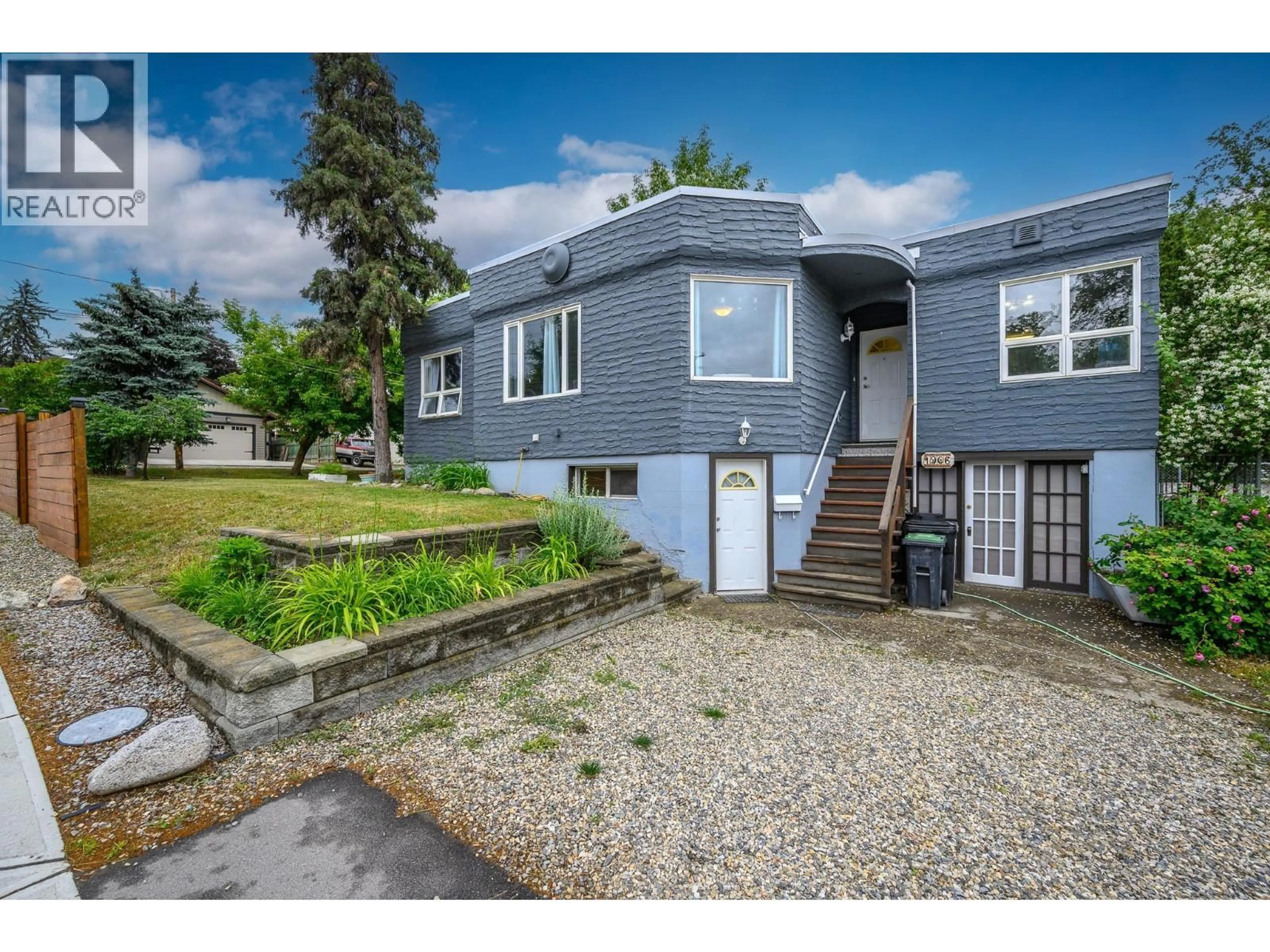 A pic from outside/outdoor area/front of a property/back of a property/a pic from drone, street for 1906 32 AVENUE, Vernon British Columbia V1T2J7