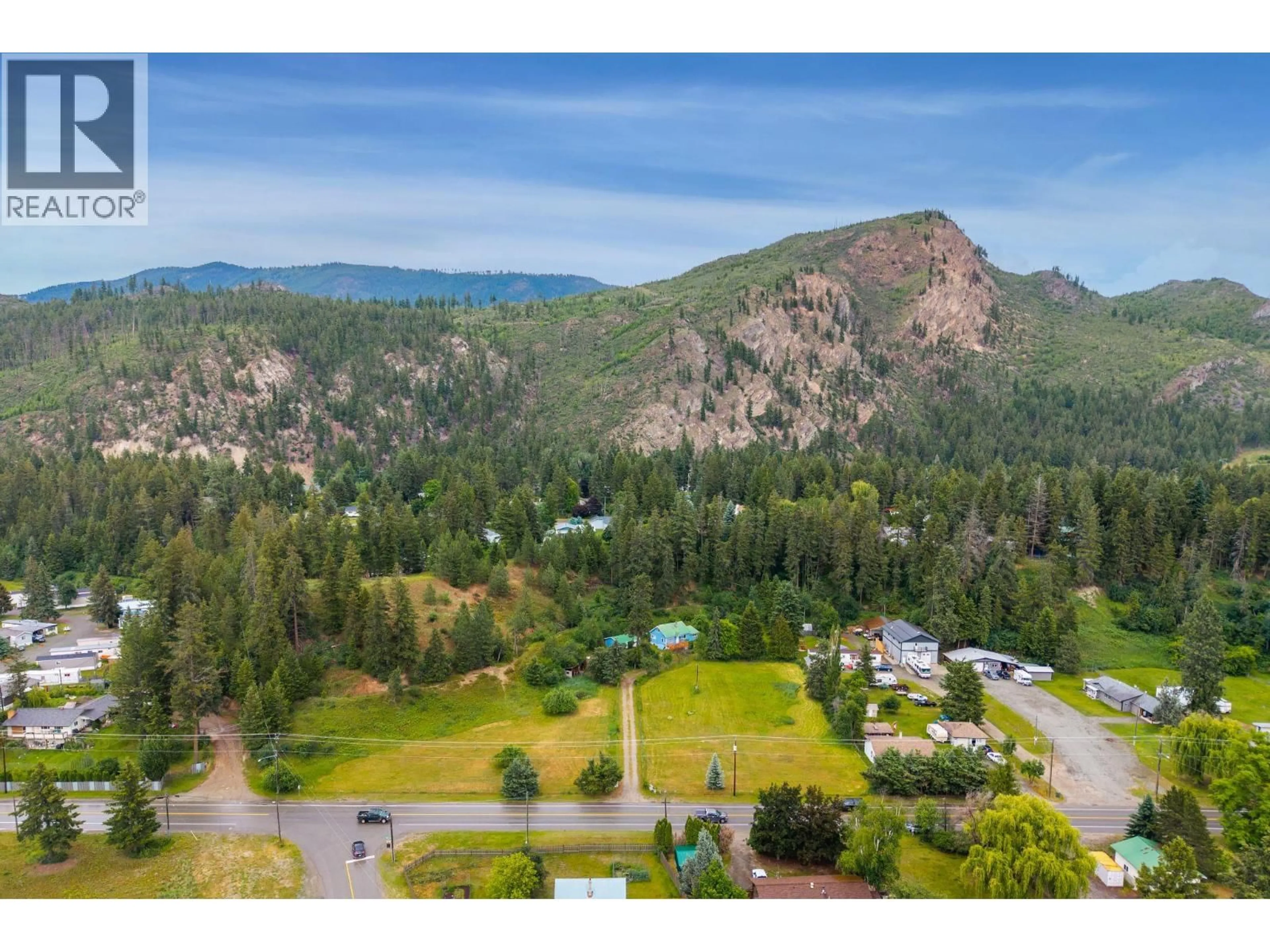 A pic from outside/outdoor area/front of a property/back of a property/a pic from drone, mountain view for 4392 BARRIERE TOWN ROAD, Barriere British Columbia V0E1E0