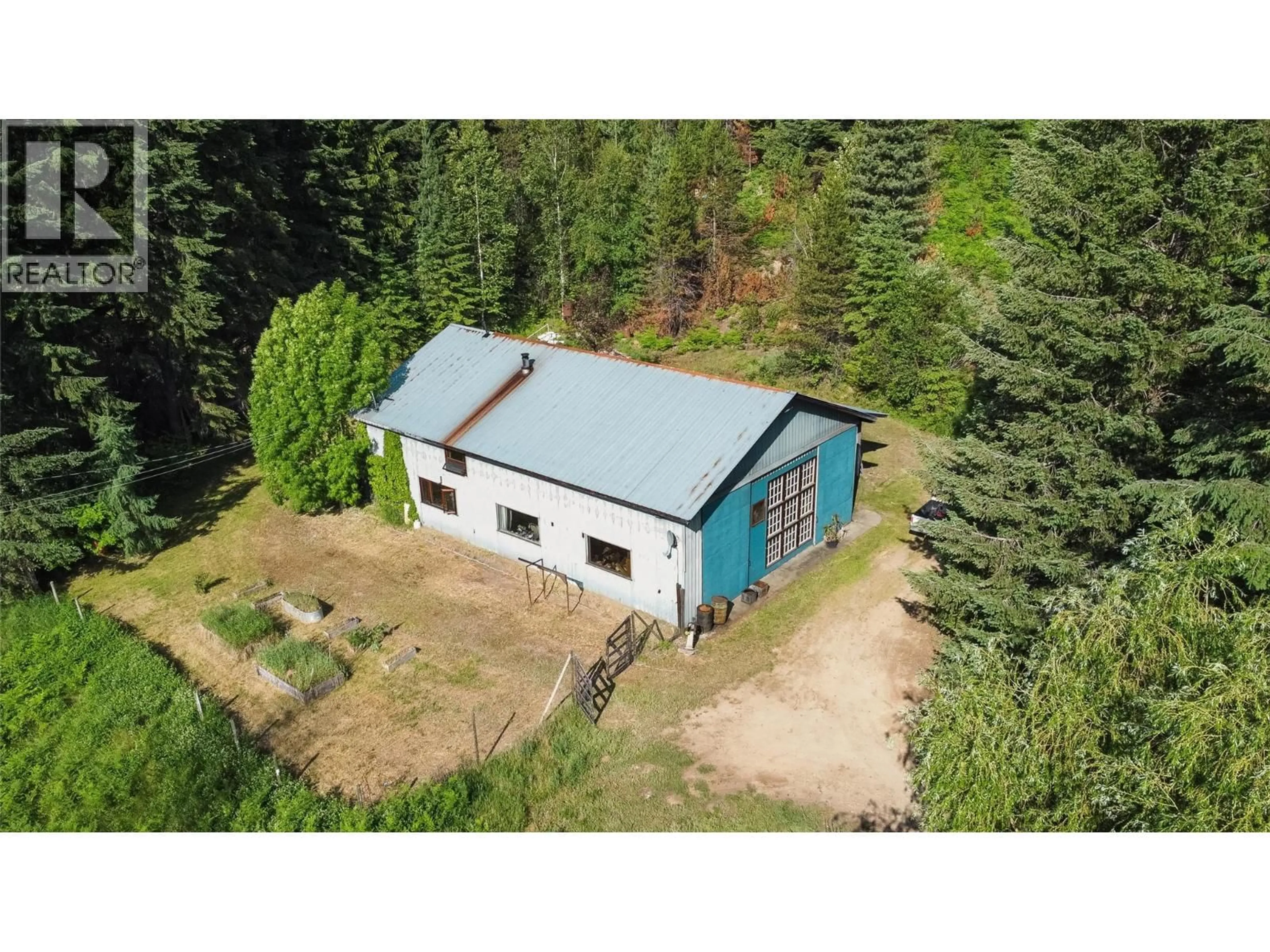 A pic from outside/outdoor area/front of a property/back of a property/a pic from drone, building for 6777 PERRY'S BACK ROAD, Winlaw British Columbia V0G2J0