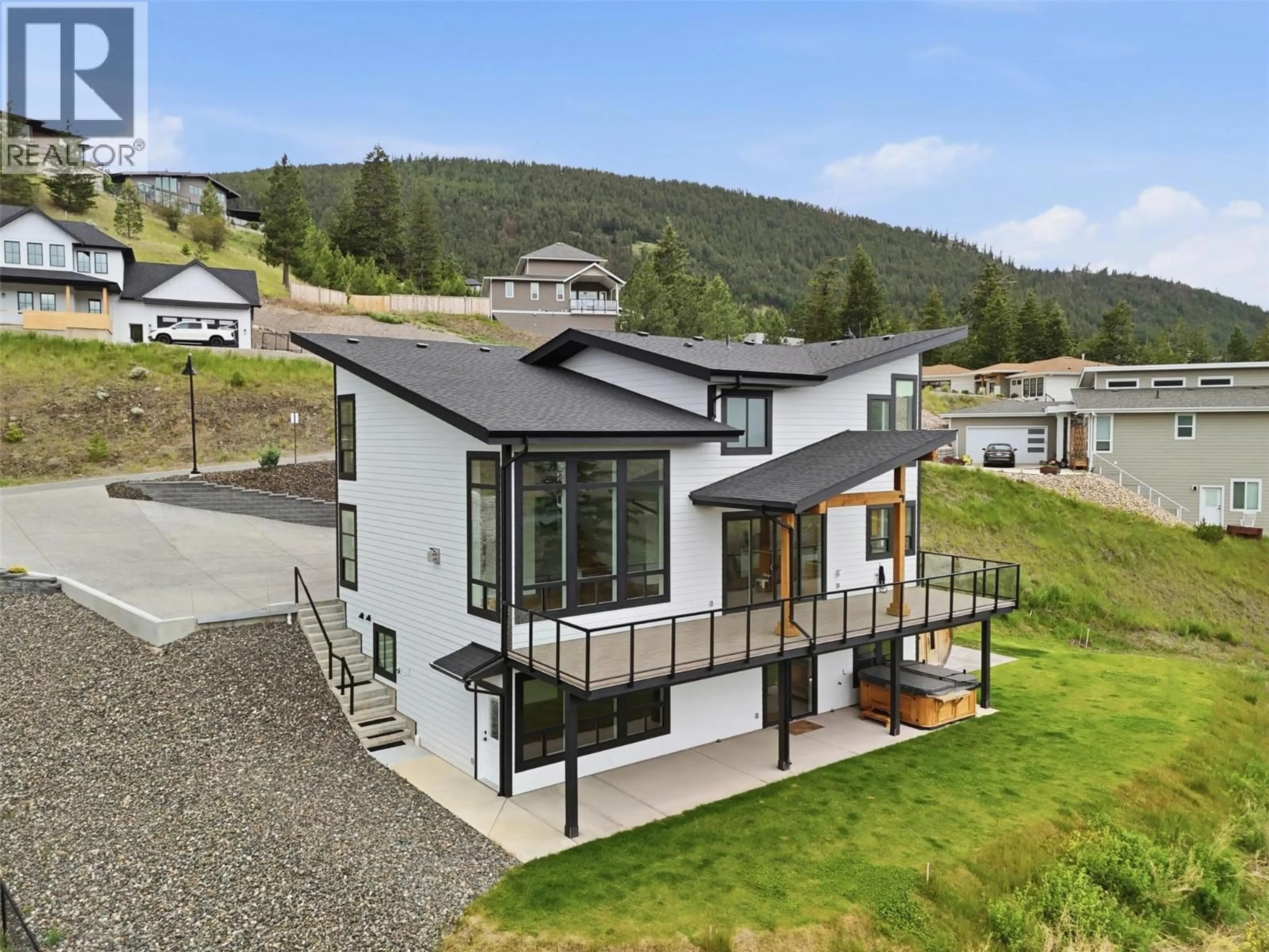 A pic from outside/outdoor area/front of a property/back of a property/a pic from drone, mountain view for 3 - 3100 KICKING HORSE DRIVE, Kamloops British Columbia V2E0B8