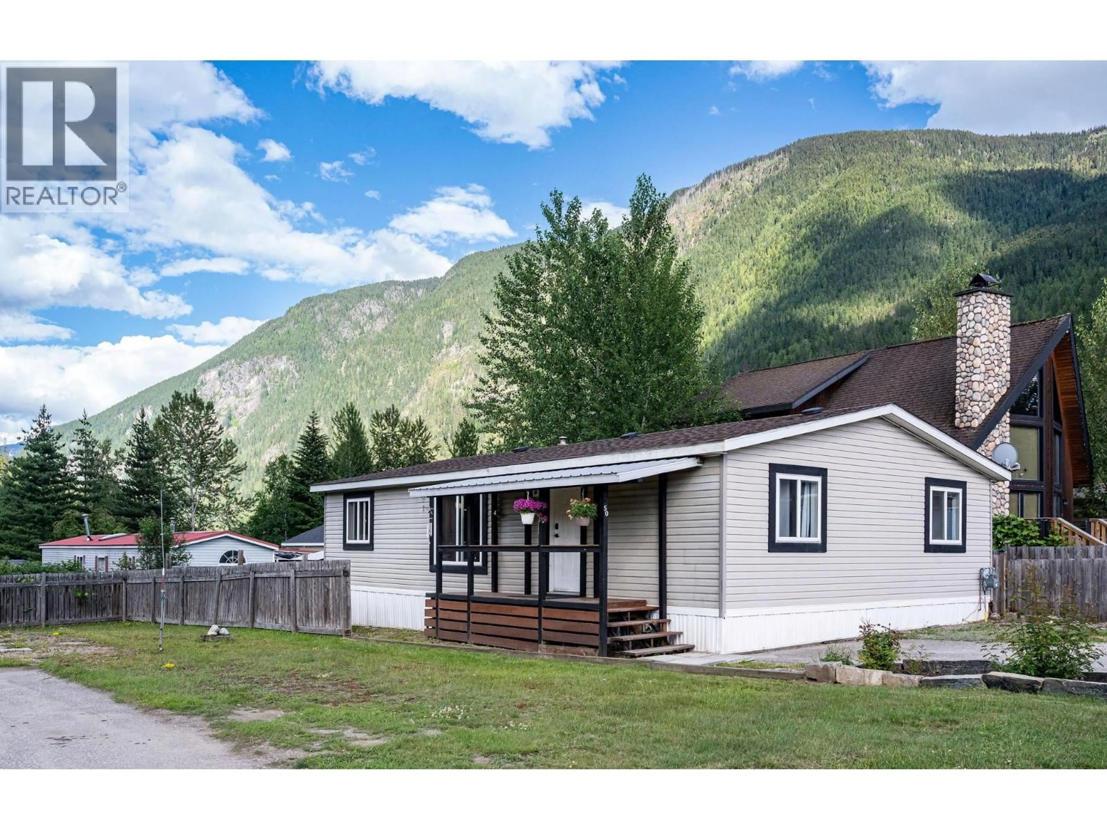 Home with vinyl exterior material, mountain view for 50 JOHNSON WAY, Revelstoke British Columbia V0E2S0