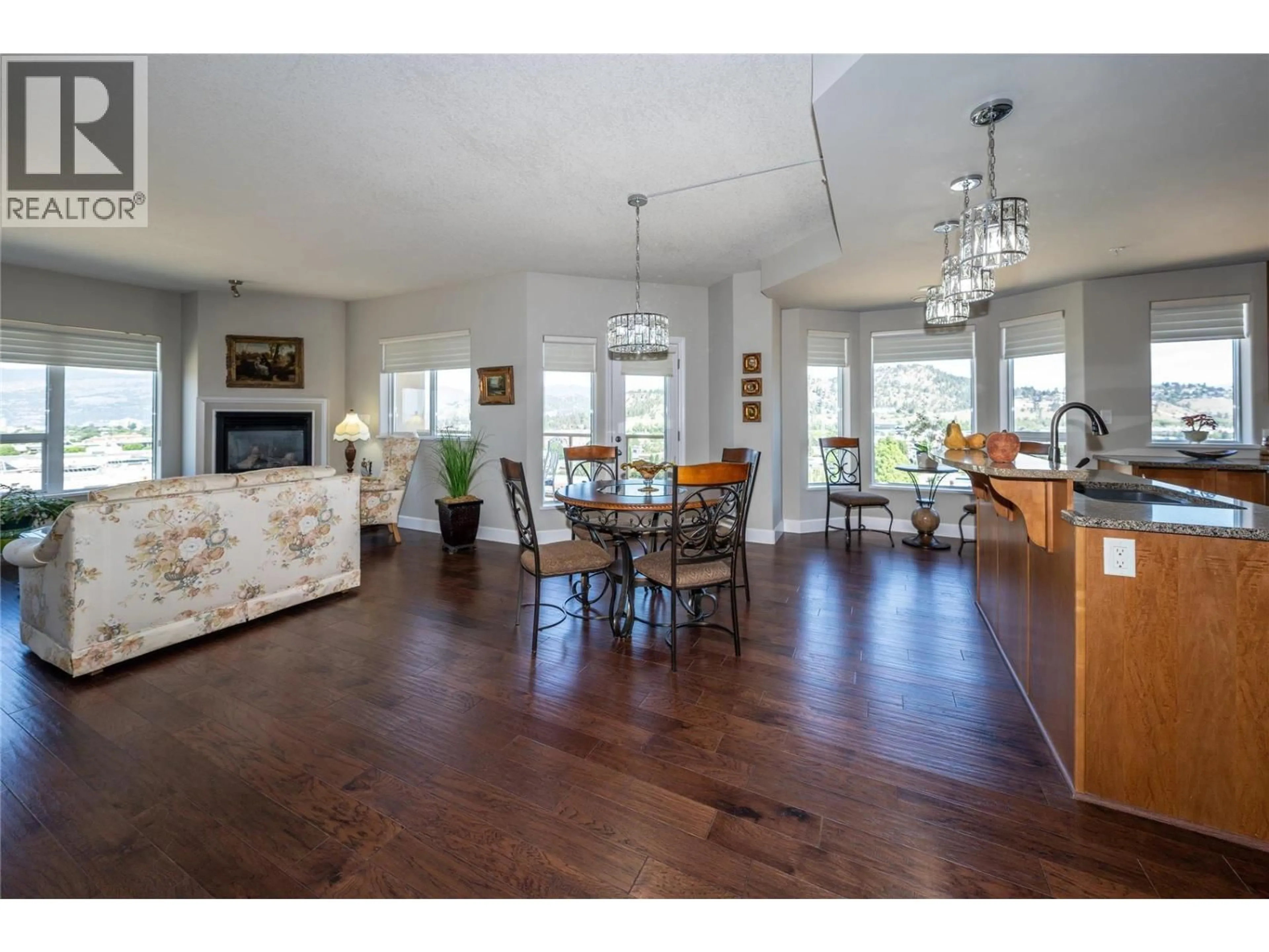 Open concept kitchen, wood/laminate floor for 1006 - 1947 UNDERHILL STREET, Kelowna British Columbia V1X7Z5