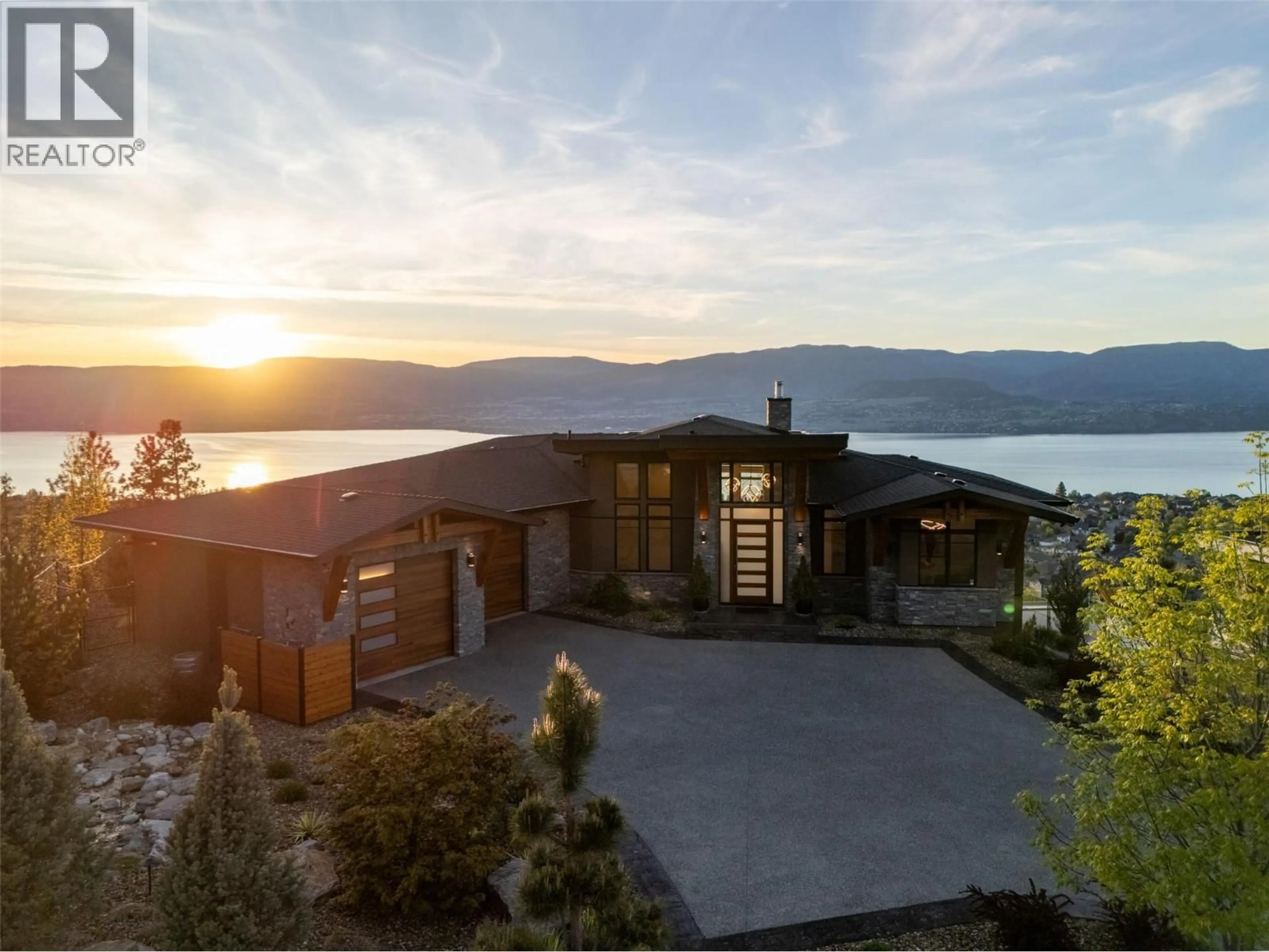 A pic from outside/outdoor area/front of a property/back of a property/a pic from drone, water/lake/river/ocean view for 105 - 5650 THE EDGE PLACE, Kelowna British Columbia V1W5M4