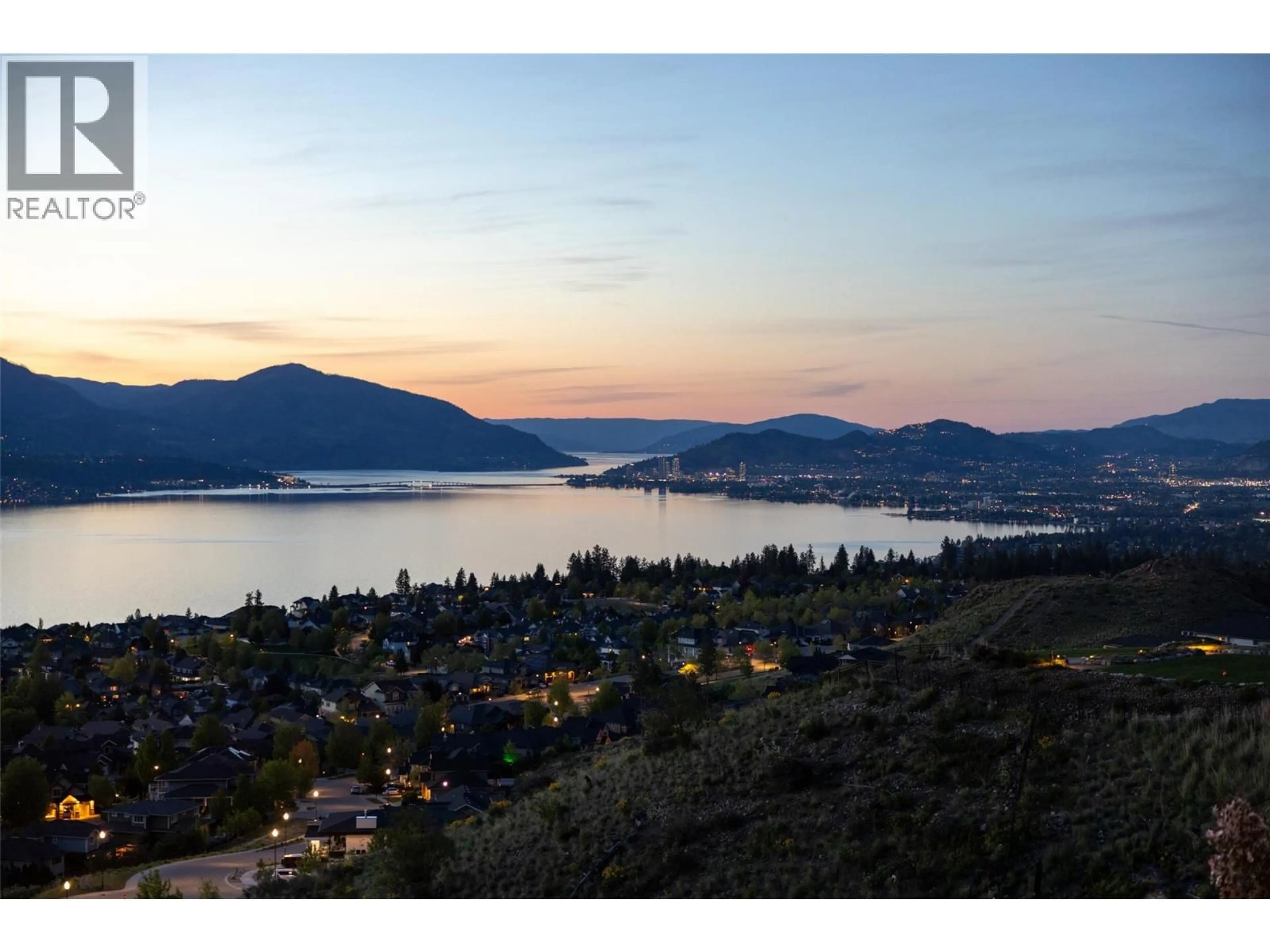 A pic from outside/outdoor area/front of a property/back of a property/a pic from drone, water/lake/river/ocean view for 105 - 5650 THE EDGE PLACE, Kelowna British Columbia V1W5M4