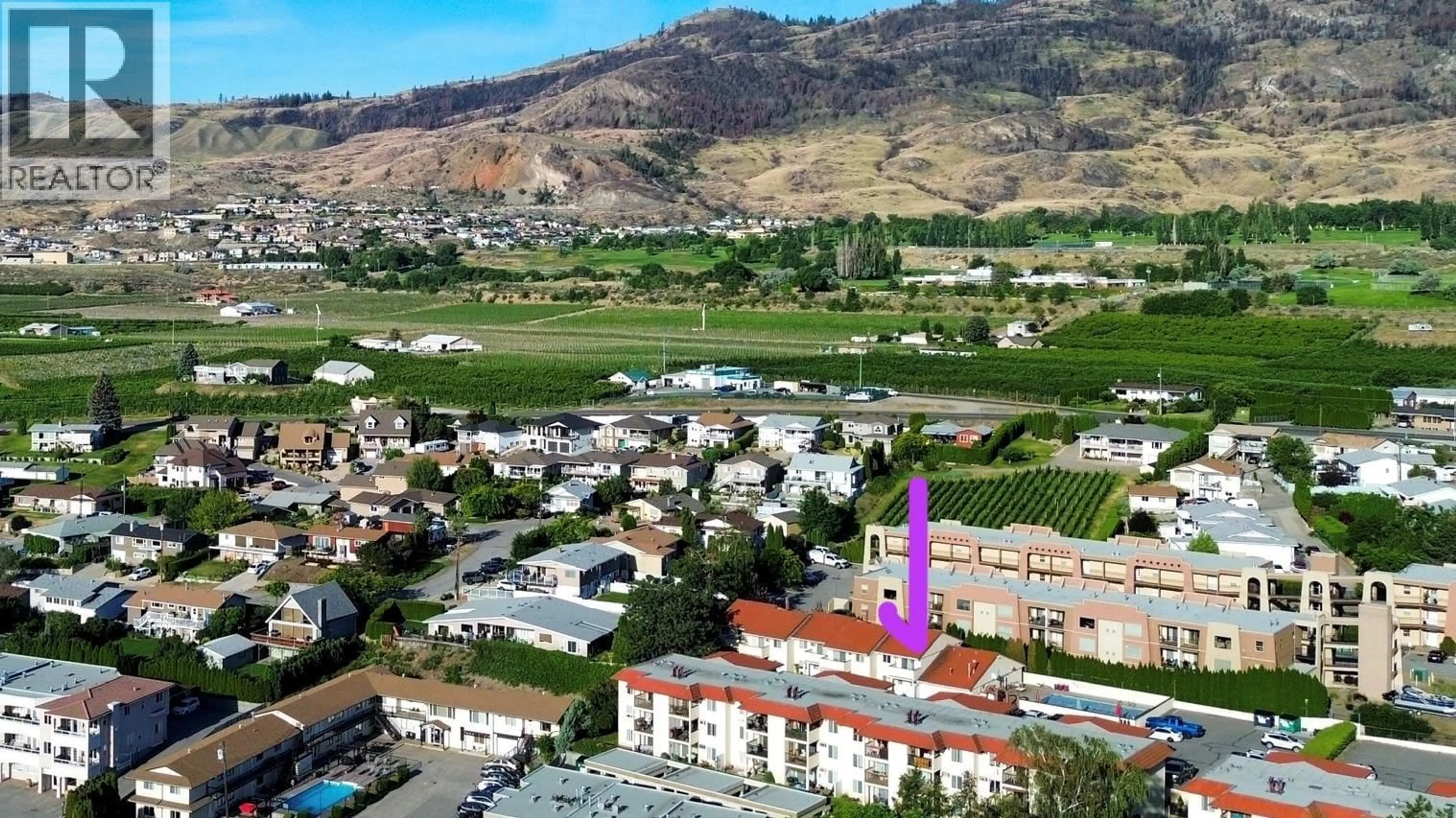 A pic from outside/outdoor area/front of a property/back of a property/a pic from drone, mountain view for 52 - 9107 62ND AVENUE, Osoyoos British Columbia V0H1V0