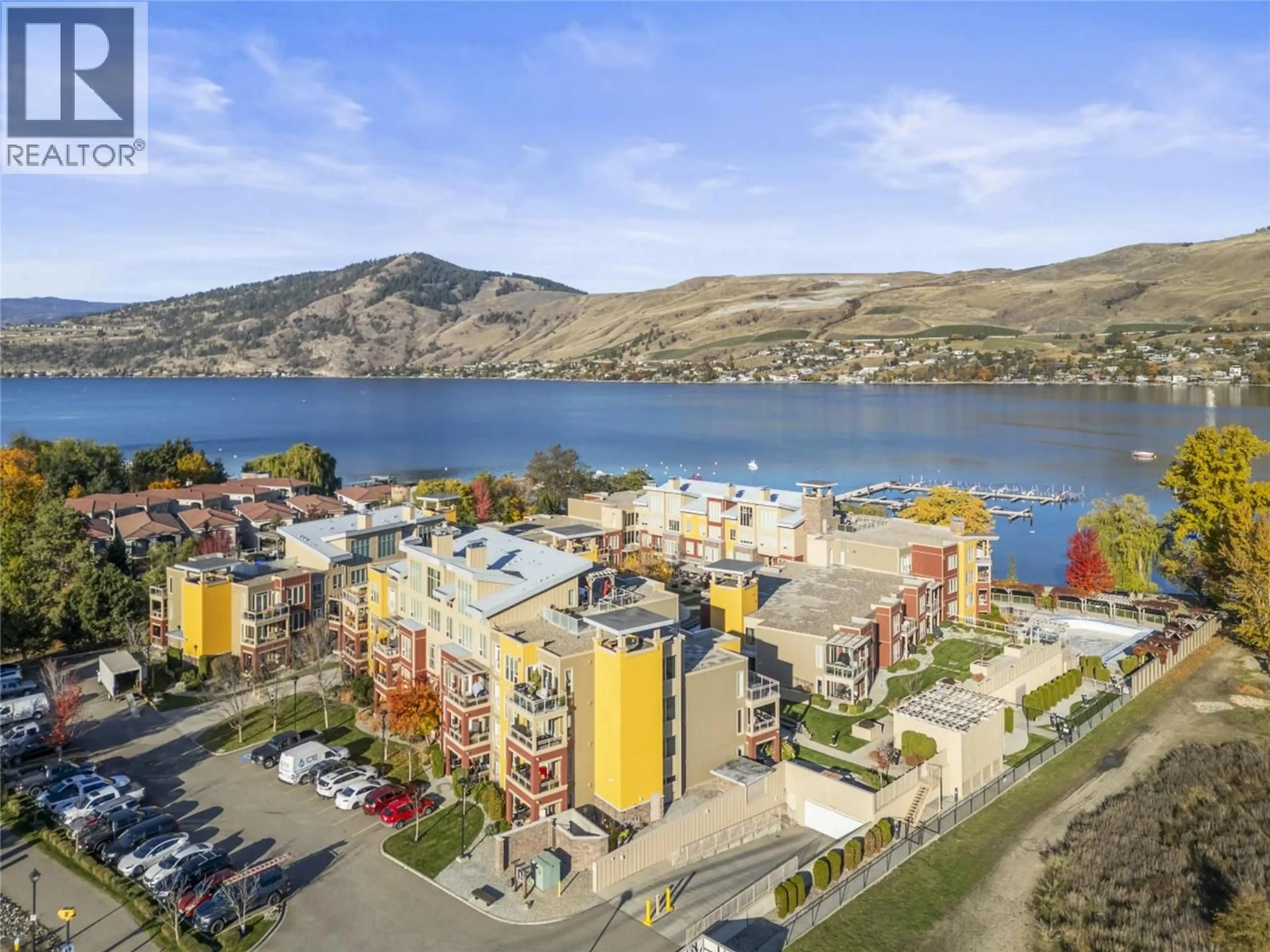 A pic from outside/outdoor area/front of a property/back of a property/a pic from drone, water/lake/river/ocean view for 1118 - 7343 OKANAGAN LANDING ROAD, Vernon British Columbia V1H2J6