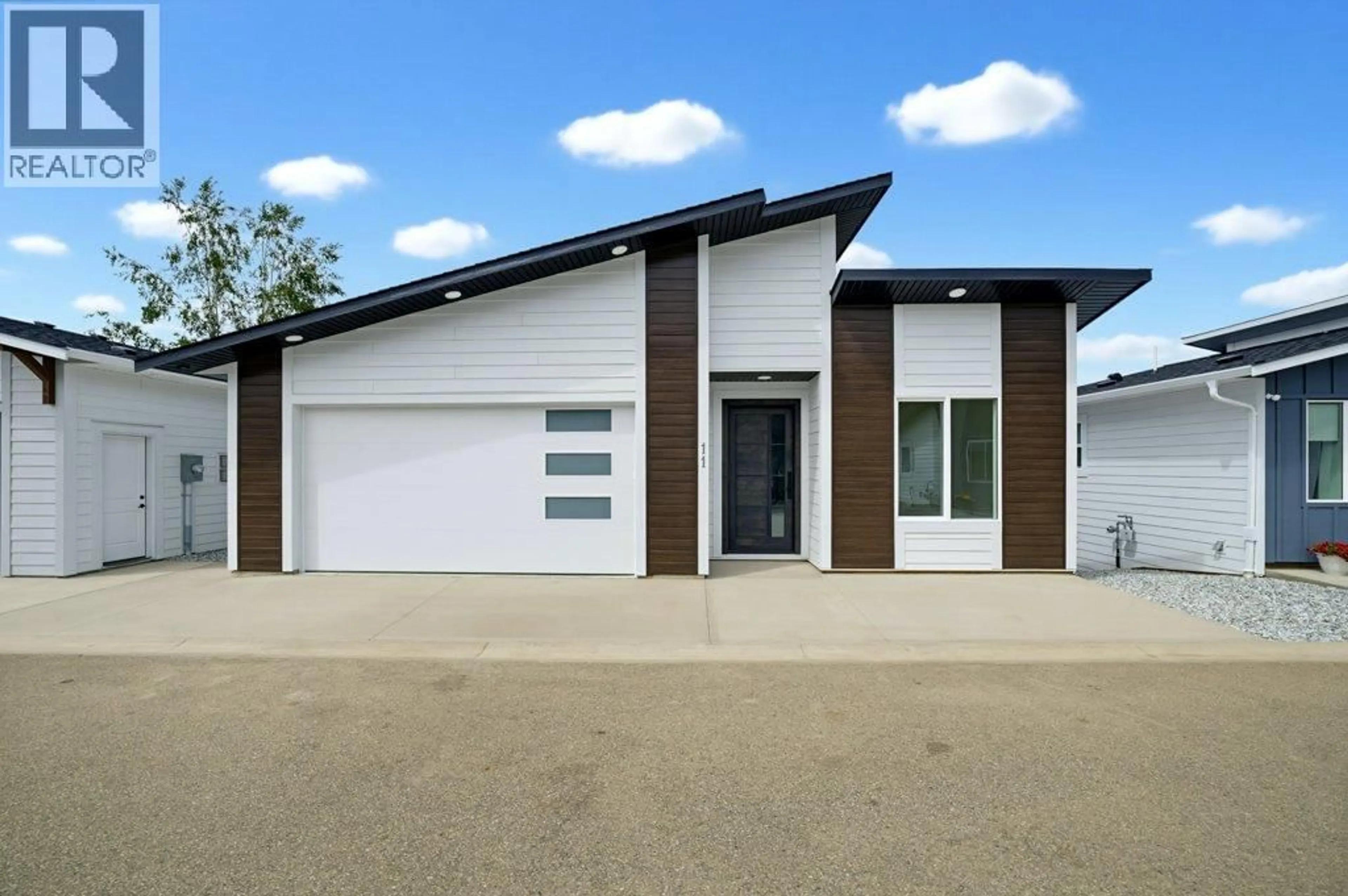 Home with brick exterior material, street for 11 - 1840 10 STREET SOUTHWEST, Salmon Arm British Columbia V1E0H2