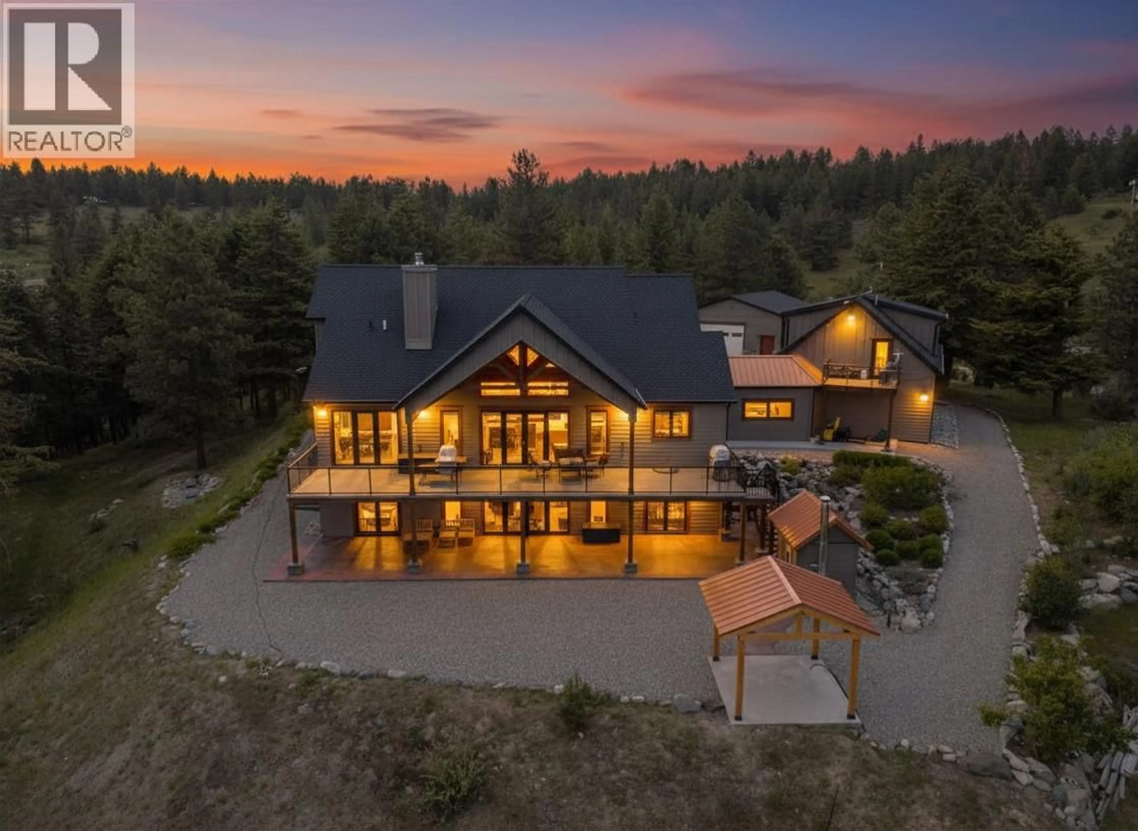 A pic from outside/outdoor area/front of a property/back of a property/a pic from drone, mountain view for 935 EAGLE PLACE, Osoyoos British Columbia V0H1V6