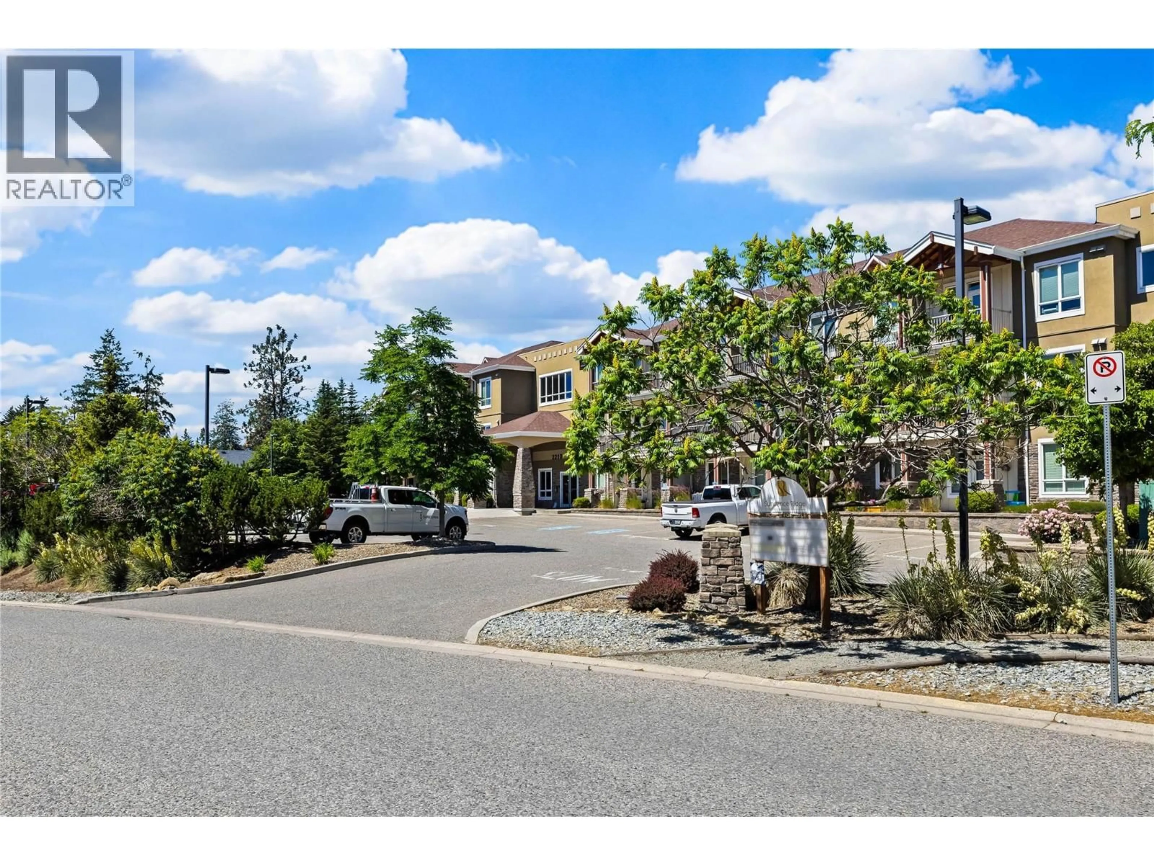 A pic from outside/outdoor area/front of a property/back of a property/a pic from drone, street for 1112 - 2210 UPPER SUNDANCE DRIVE, West Kelowna British Columbia V4T3E9