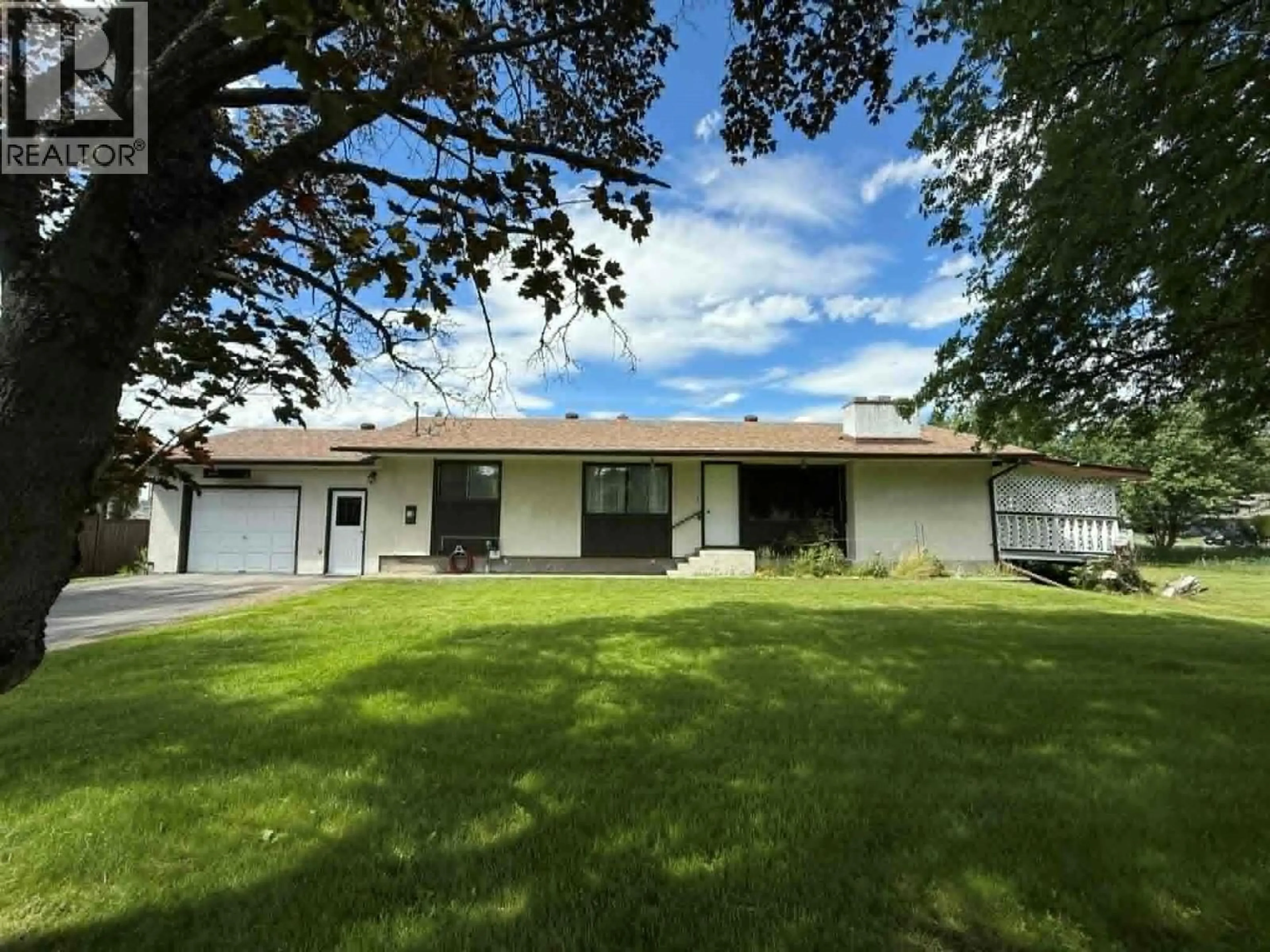 A pic from outside/outdoor area/front of a property/back of a property/a pic from drone, street for 1003 BRIDGEVIEW CRESCENT, Castlegar British Columbia V1N4K9