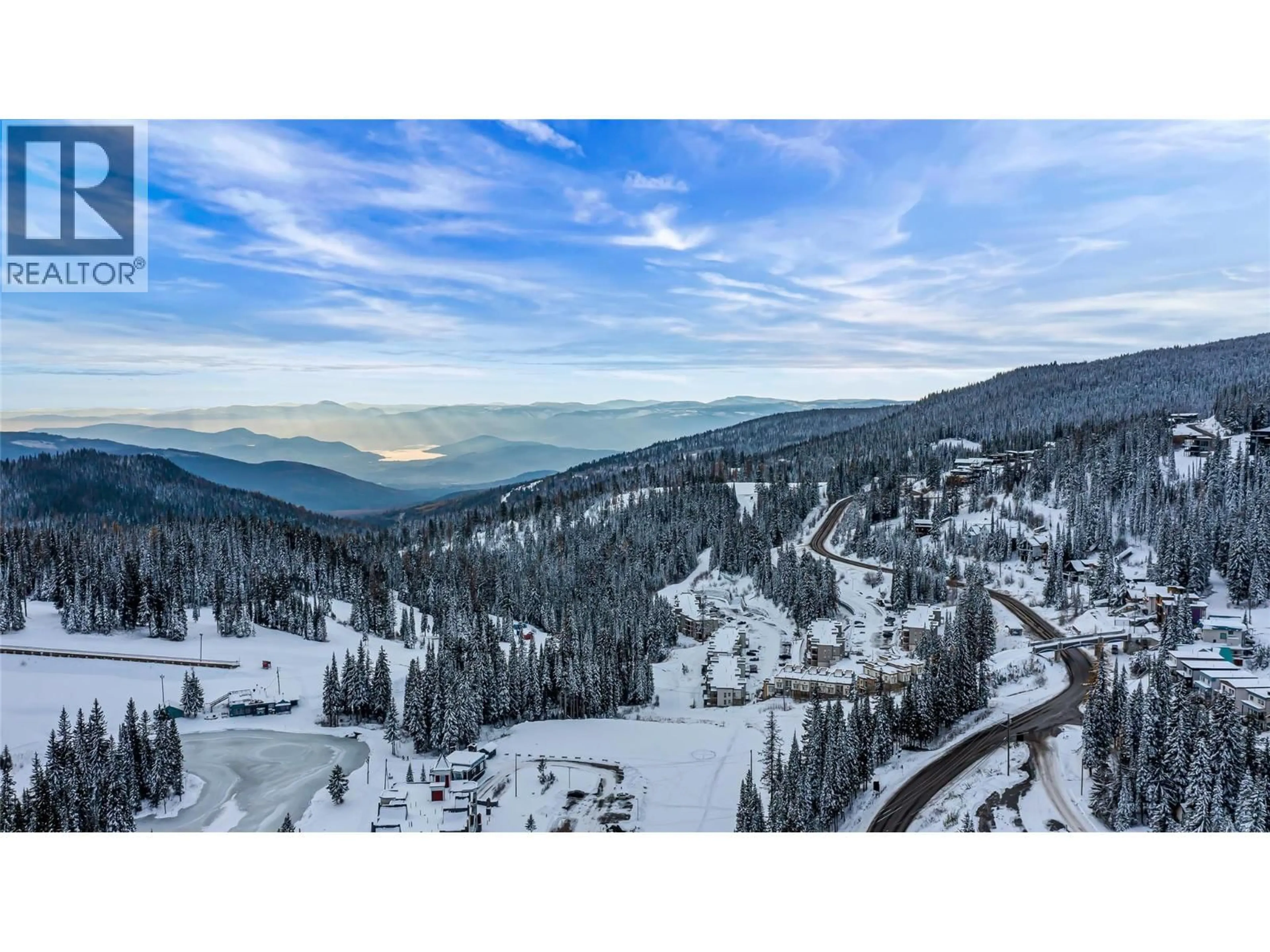 A pic from outside/outdoor area/front of a property/back of a property/a pic from drone, mountain view for 302 - 9812 SILVER STAR ROAD, Vernon British Columbia V1B3X9